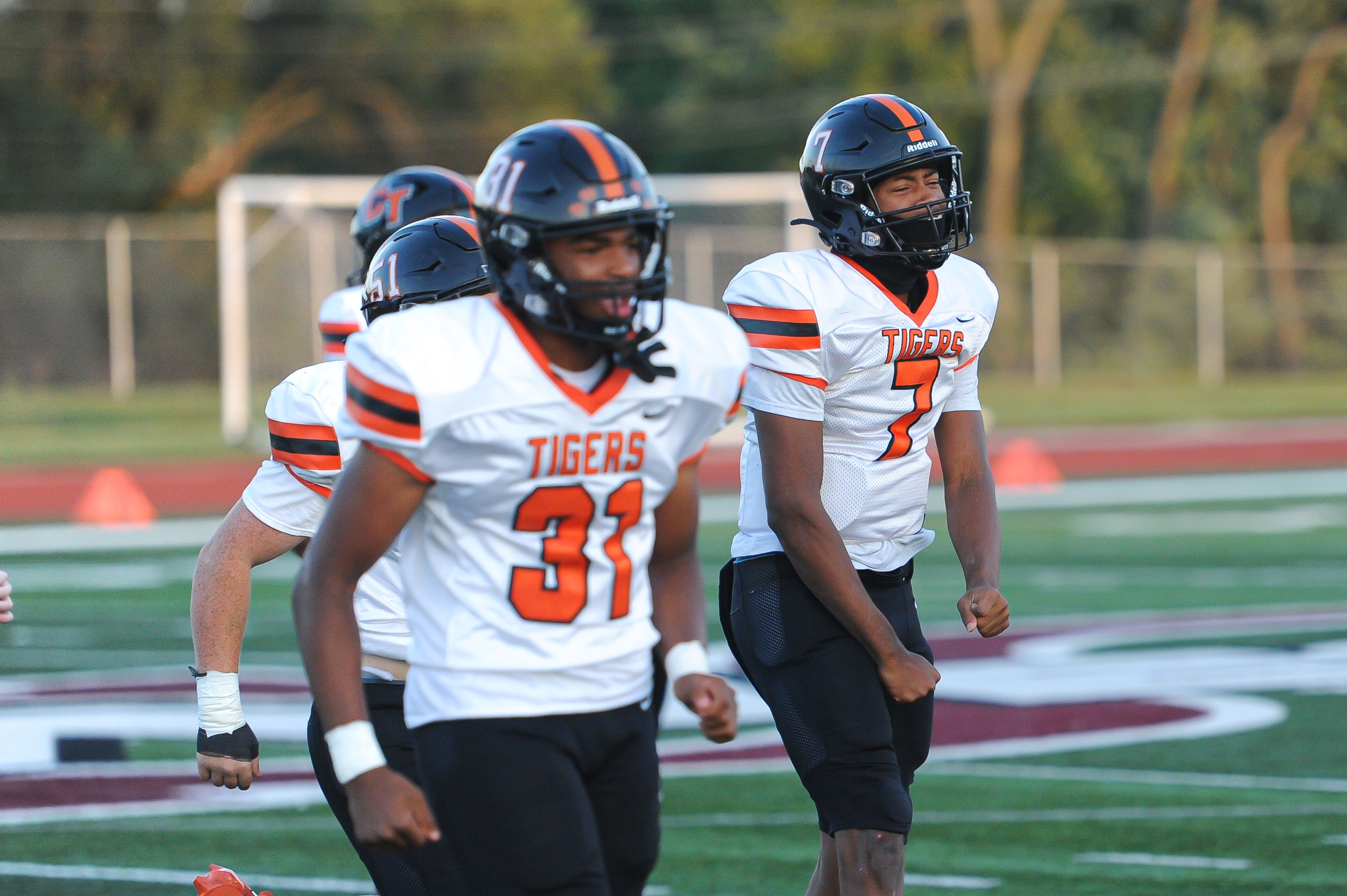 Cape Central's Malachi Smoot (right) celebrates a turnover during a Friday, September 6, 2024 game between the St. Charles West Warriors and the Cape Central Tigers at St. Charles West High School in St. Charles, Mo. Cape Central defeated St. Charles West, 35-0.