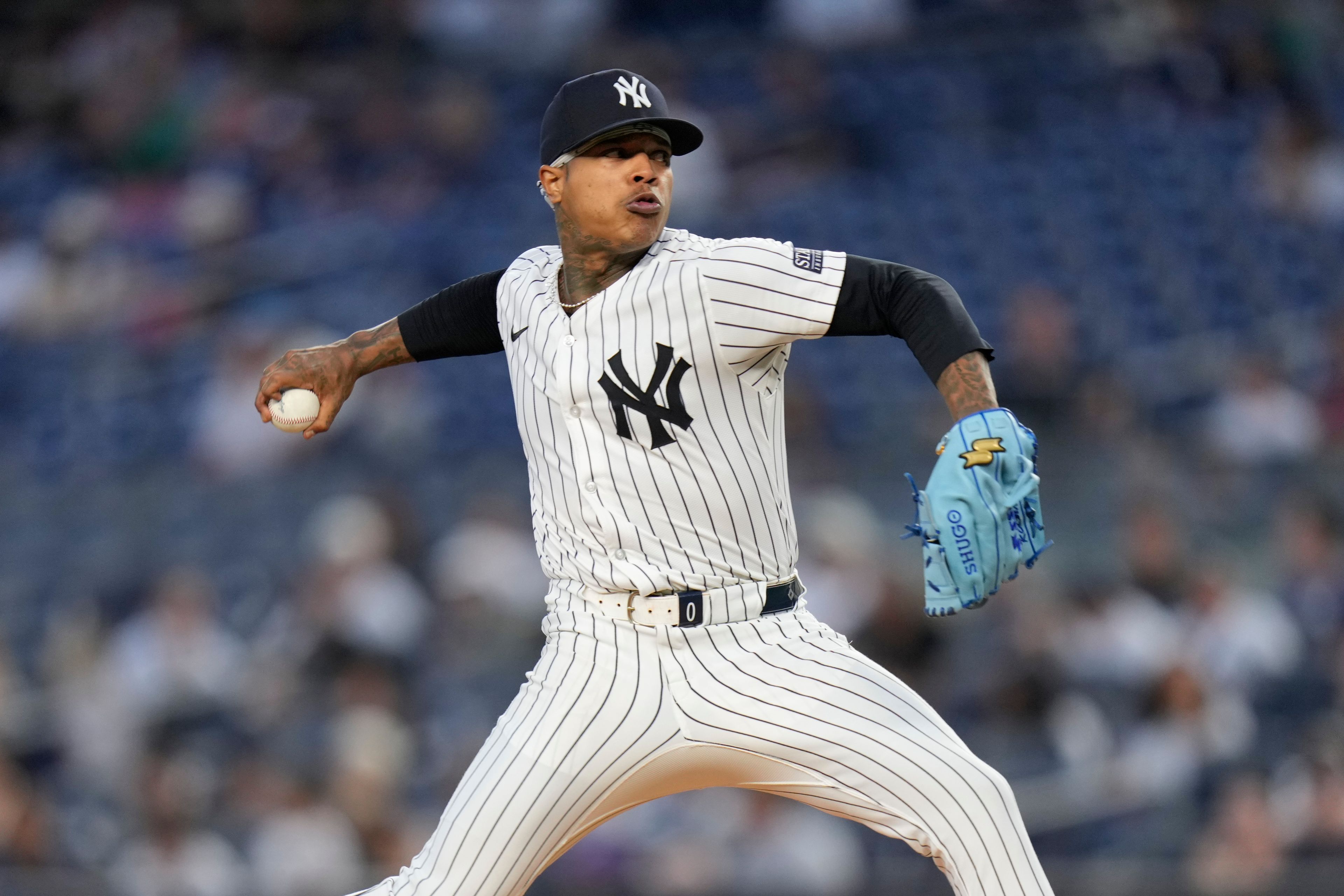 New York Yankees pitcher Marcus Stroman throws during the first inning of a baseball game against the Kansas City Royals at Yankee Stadium, Tuesday, Sept. 10, 2024, in New York. (AP Photo/Seth Wenig)