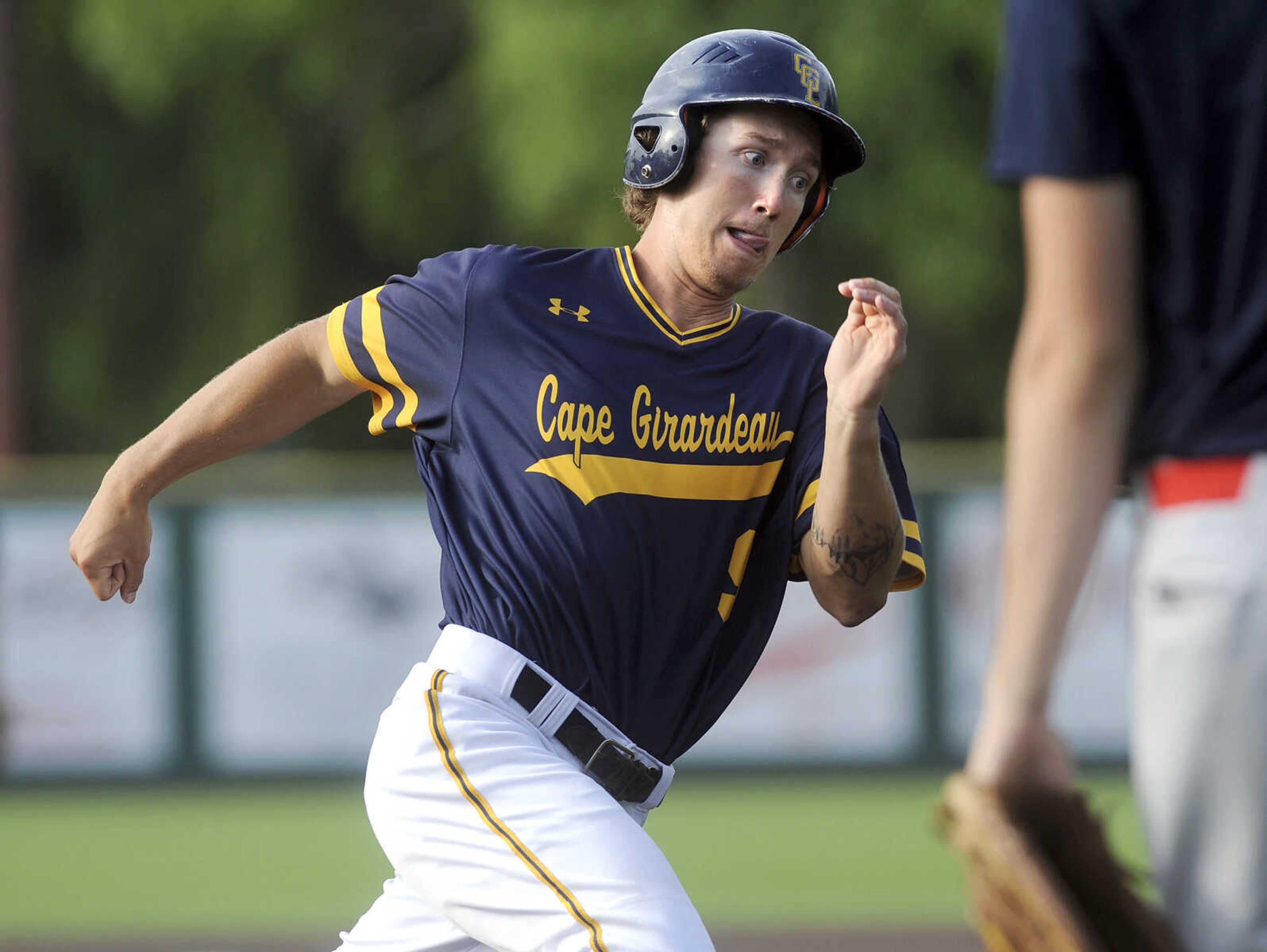 FRED LYNCH ~ flynch@semissourian.com
Cape Girardeau Post 63's Trevor Haas heads for home on a double by Trent Unterreiner against Sikeston during the first inning of the first game Wednesday, June 20, 2018 at Capaha Field.