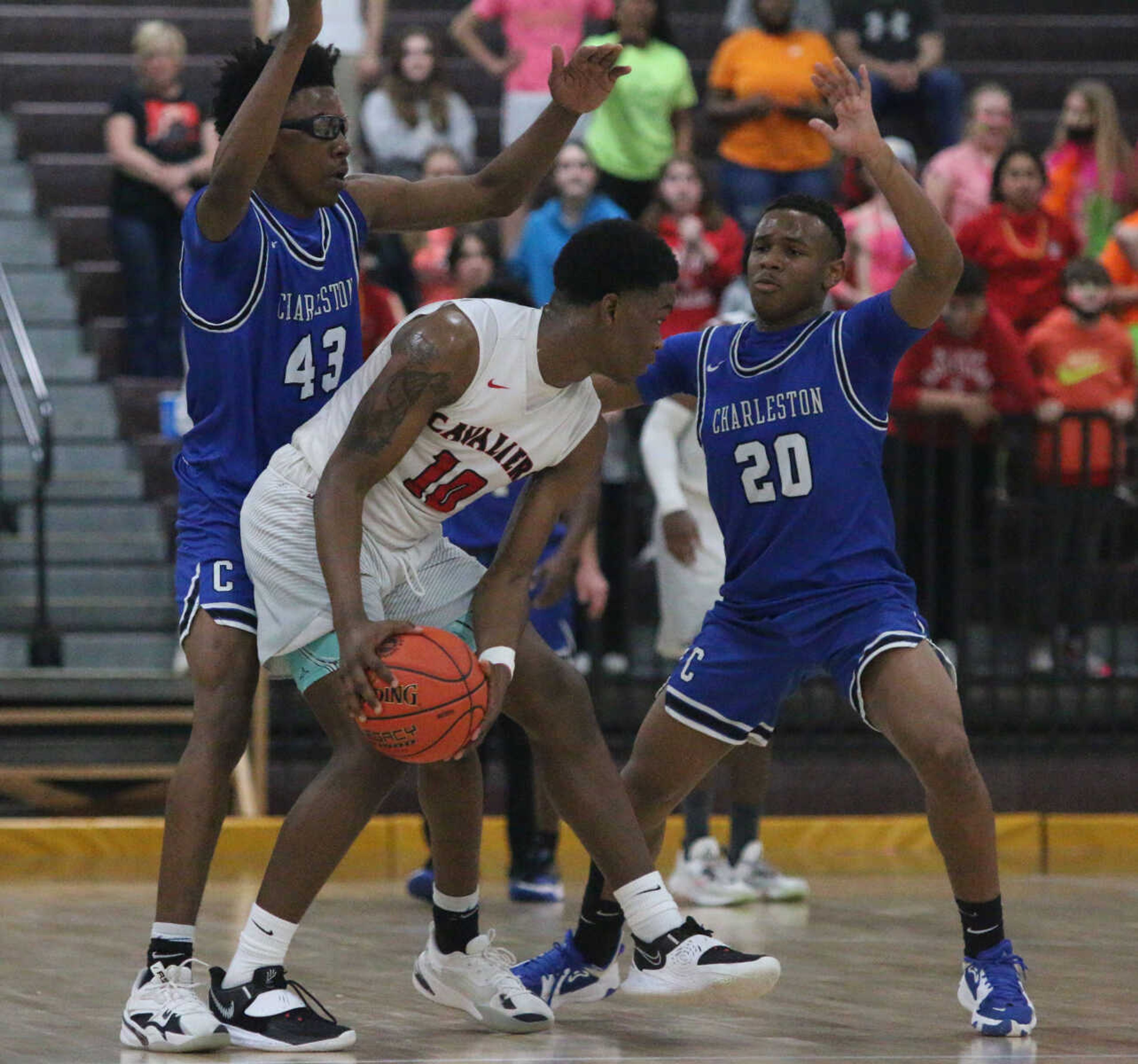 Rico Coleman and Almareion Williams trap Eddie Weekly III during Charleston's 74-61 win over Bishop DuBourg in a Class 3 quarterfinal at the Farmington Community Civic Center on Saturday, March 5. (Dennis Marshall/Standard-Democrat)