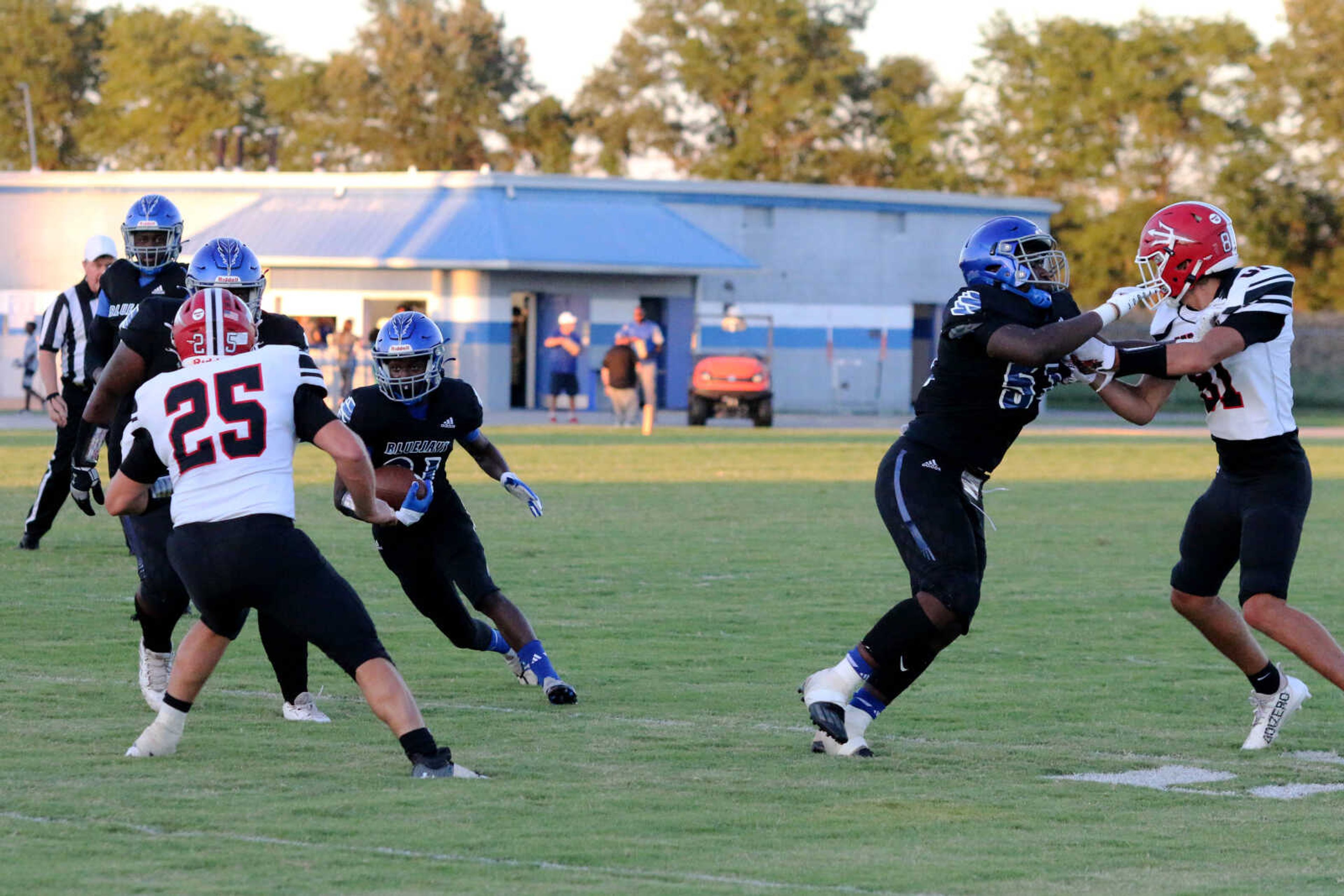 Charleston's J'Maurion Robinson (21) runs during a 14-12 loss to Chaffee at John Harris Marshall Stadium on Thursday, August 31, 2023.