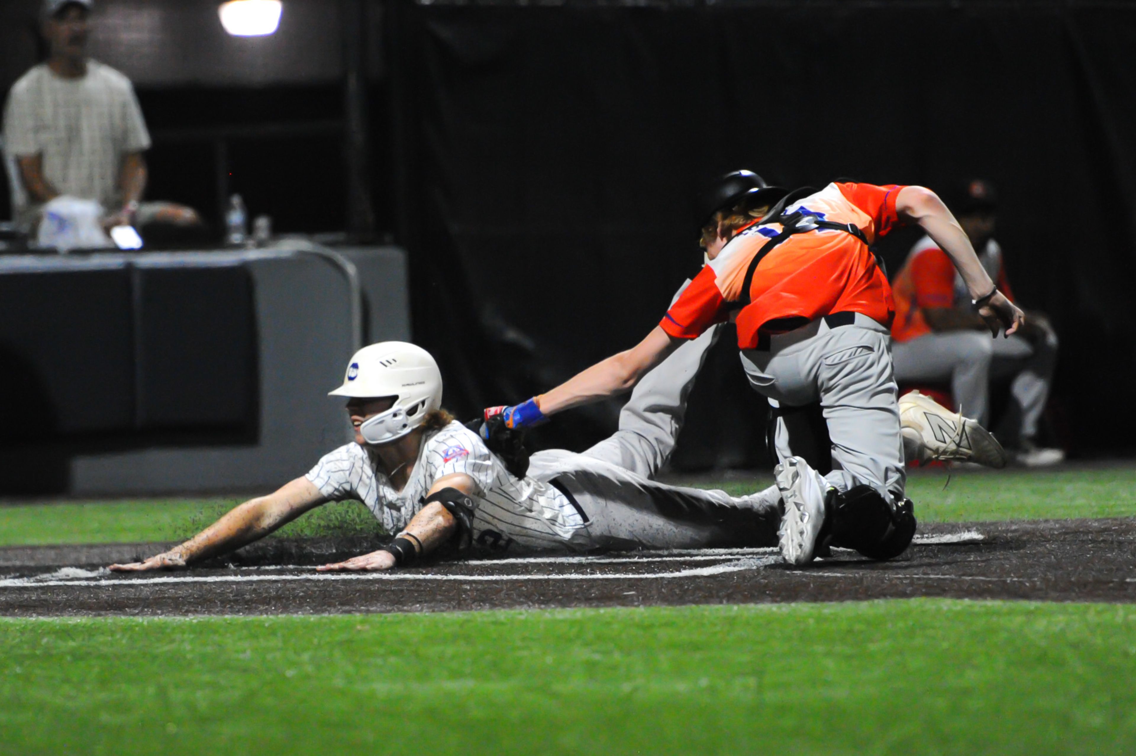 Aycorp's Owen Willis slides under the tag during a Tuesday, August 13, 2024 Babe Ruth World Series game between the Aycorp Fighting Squirrels and Holland Henson of the Netherlands at Capaha Field in Cape Girardeau, Mo. Aycorp defeated the Netherlands, 12-2 in five innings.