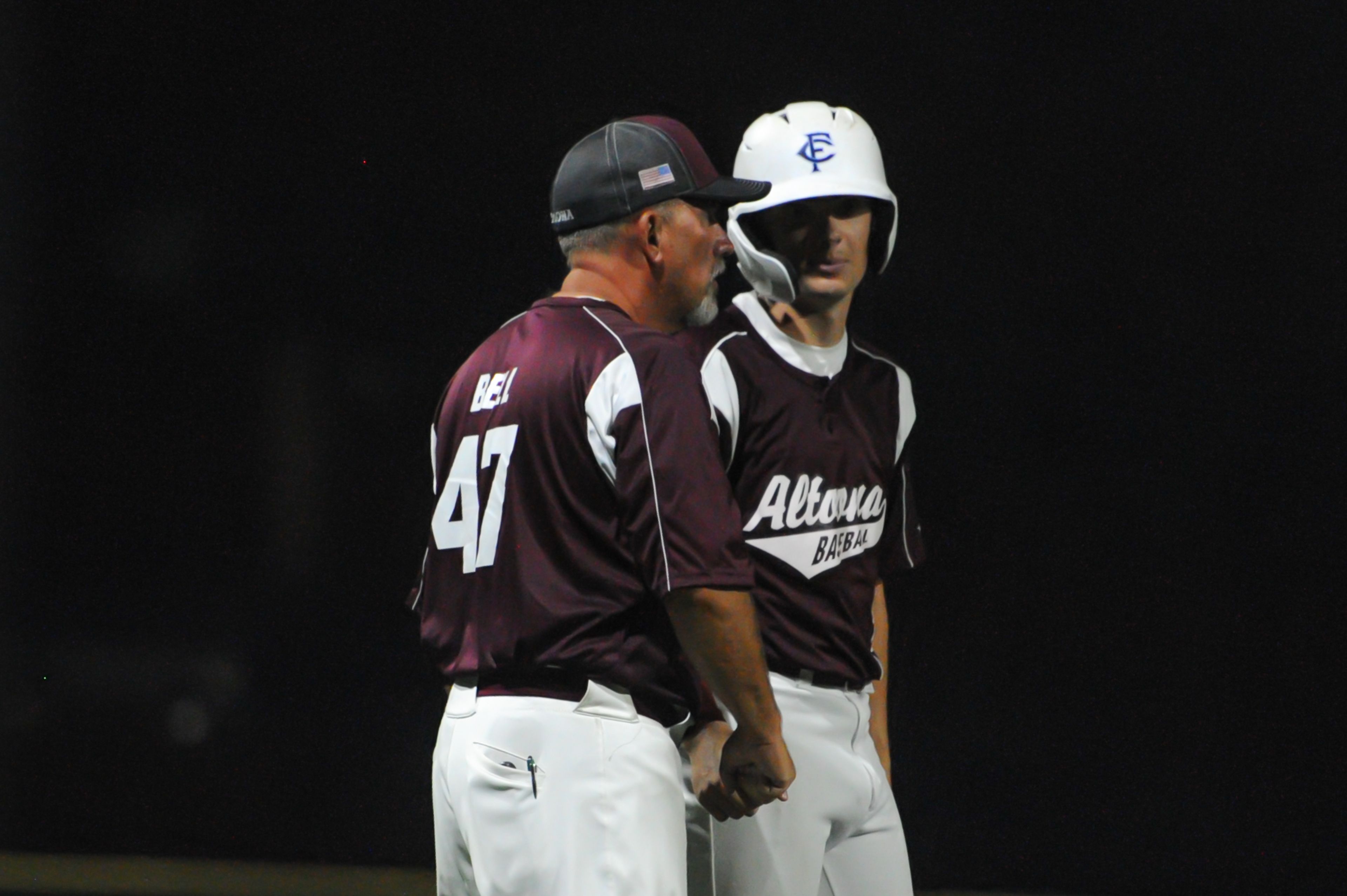 Altoona coach Brian Bell talks to a runner at third base during an August 14, 2024 Babe Ruth World Series game between the Aycorp Fighting Squirrels and the Altoona, Pennsylvania, at Capaha Field in Cape Girardeau, Mo. Aycorp defeated Altoona, 12-11.