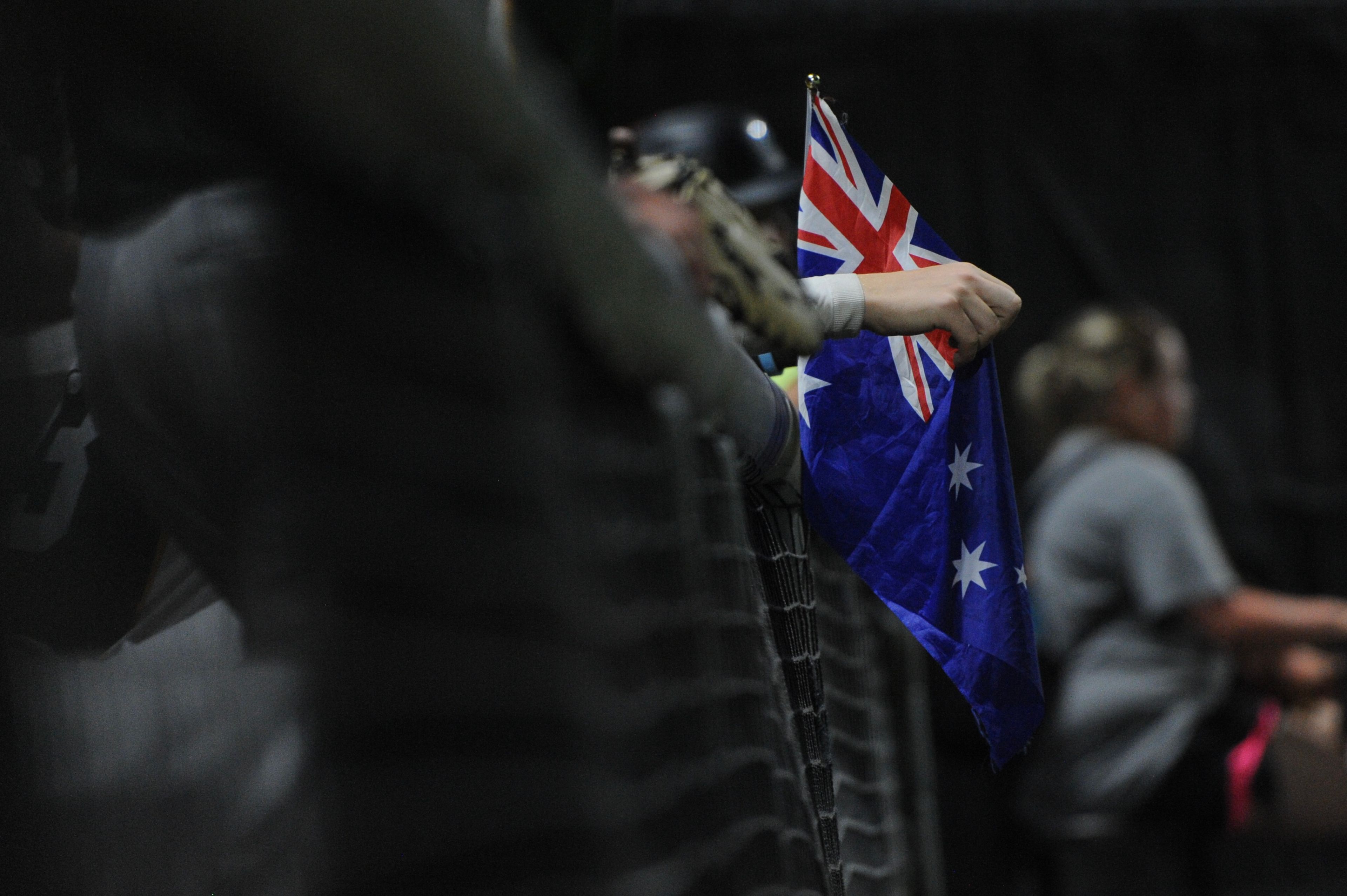 The Australian flag flies in the Aussie Drops Bear dugout during a Friday, August 9, 2024 Babe Ruth World Series game between the Aycorp Fighting Squirrels and the Australia Drop Bears at Capaha Field in Cape Girardeau, Mo. Aycorp defeated Australia, 6-0.