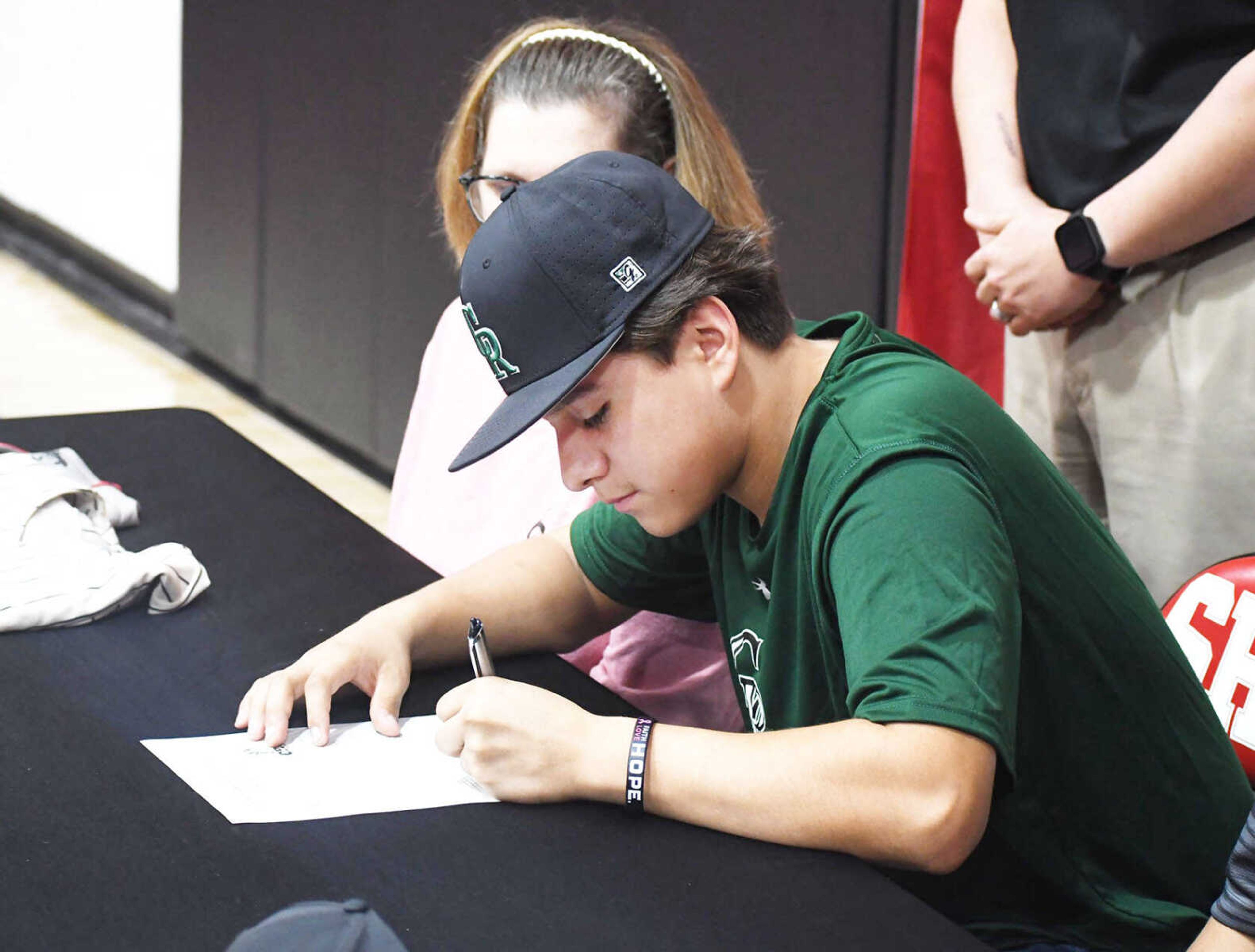 Senath-Hornersville catcher Jesus “Chuy” Mendoza signs to join the baseball program at Crowley’s Ridge in nearby Paragould, Ark. 