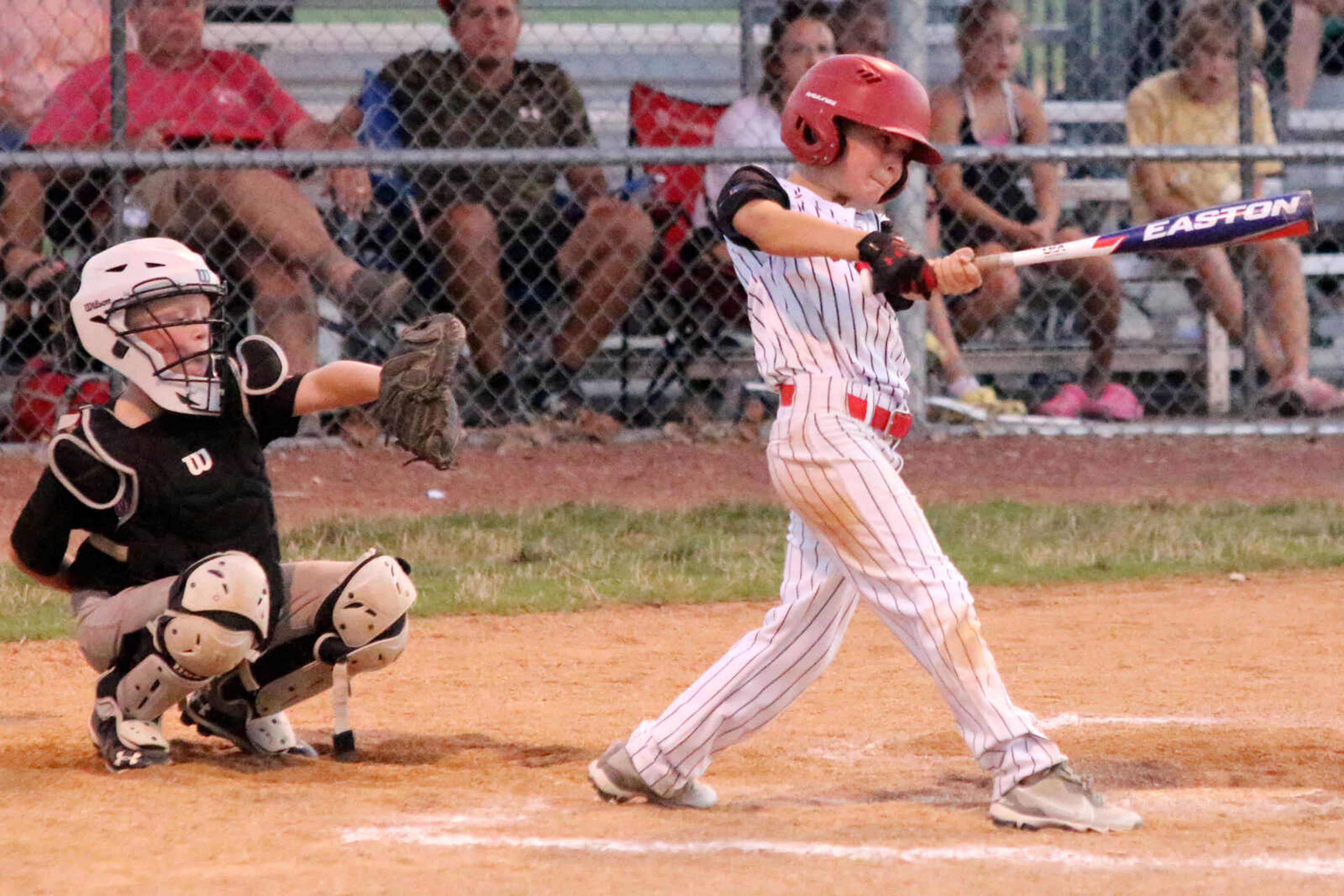 A player for the Dexter Titans takes a swing against Mineral Area on Thursday, July 27, in the opening game of the 2023 Cal Ripken Midwest Plains Regional at the Sports Complex. (Dennis Marshall/Standard-Democrat)