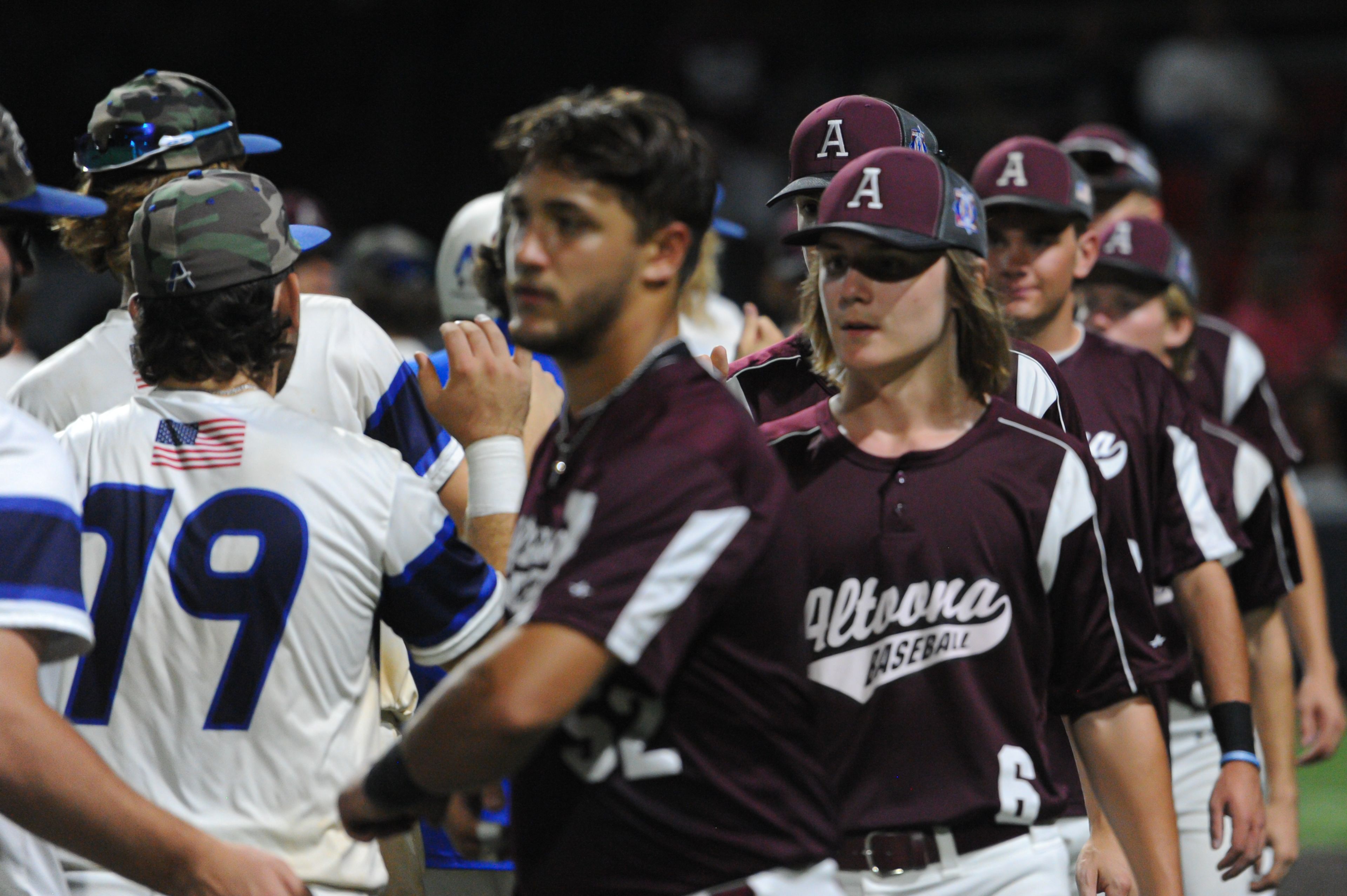 Aycorp and Altoona players shake hands following a Monday, August 12, 2024 Babe Ruth World Series game between the Aycorp Fighting Squirrels and Altoona, Pennsylvania. Aycorp won, 13-3 in five innings.