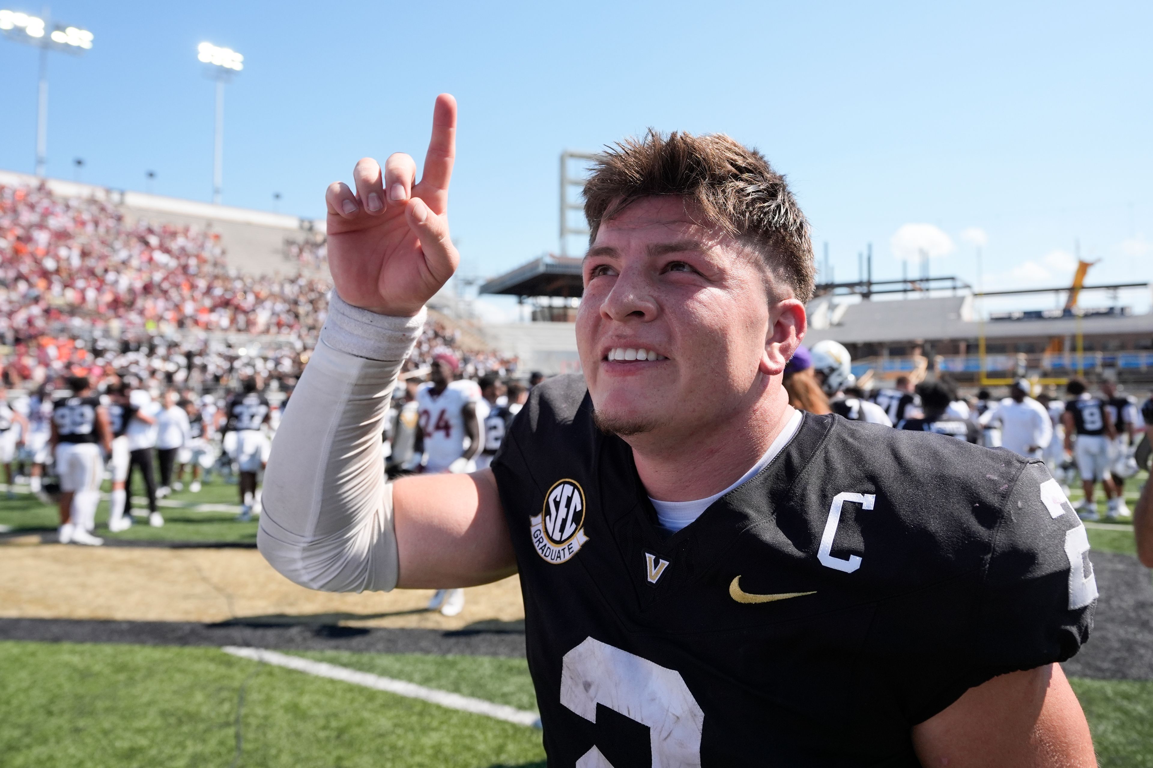 Vanderbilt quarterback Diego Pavia (2) celebrates the team's 34-27 overtime win after an NCAA college football game against Virginia Tech, Saturday, Aug. 31, 2024, in Nashville, Tenn. (AP Photo/George Walker IV)