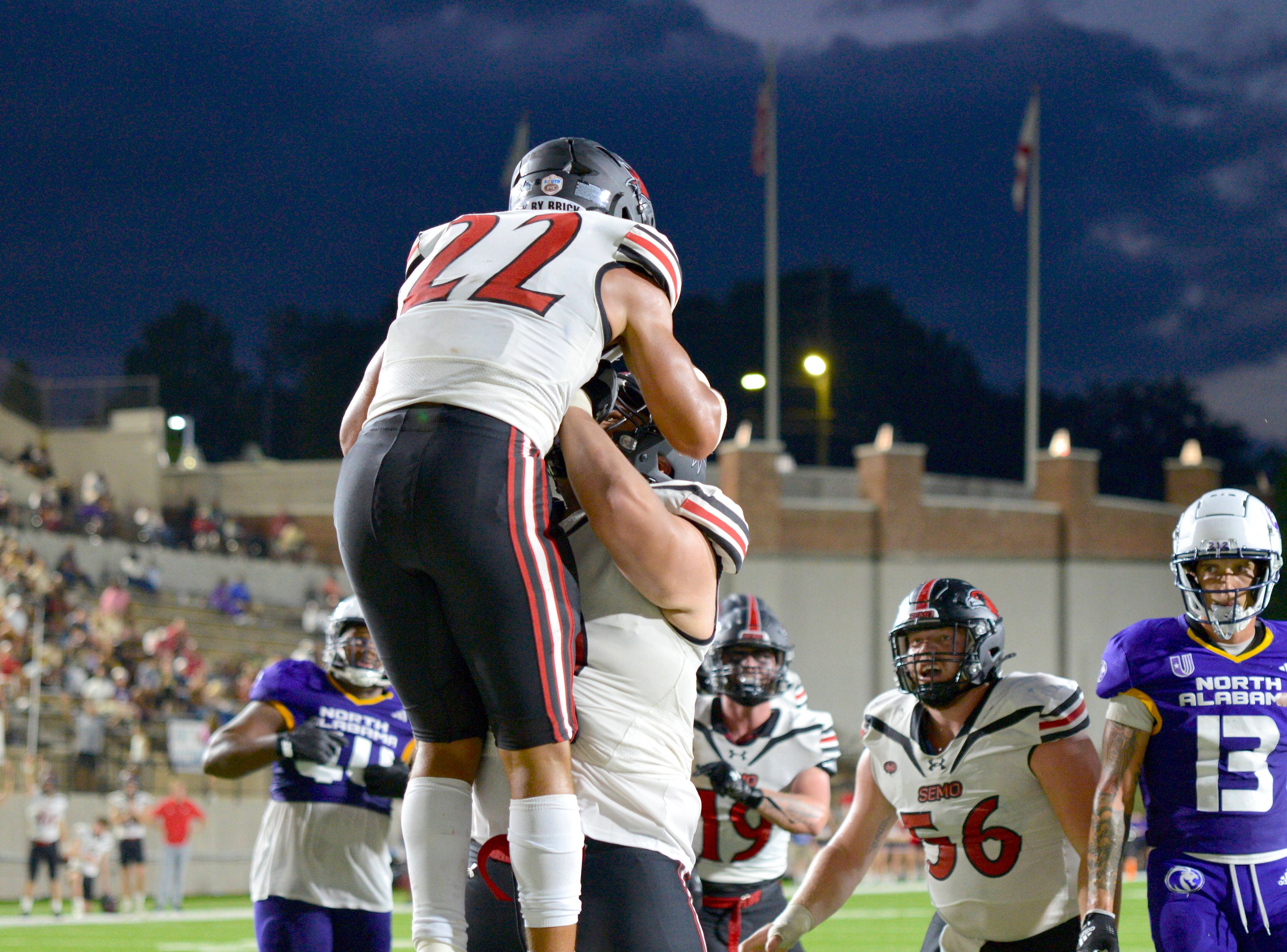 Southeast Missouri State offensive lineman Jalen Nettles picks up running back Peyton Brown in celebration of a touchdown during an FCS Kickoff game against North Alabama on Saturday, August 24, in Montgomery, Alabama.