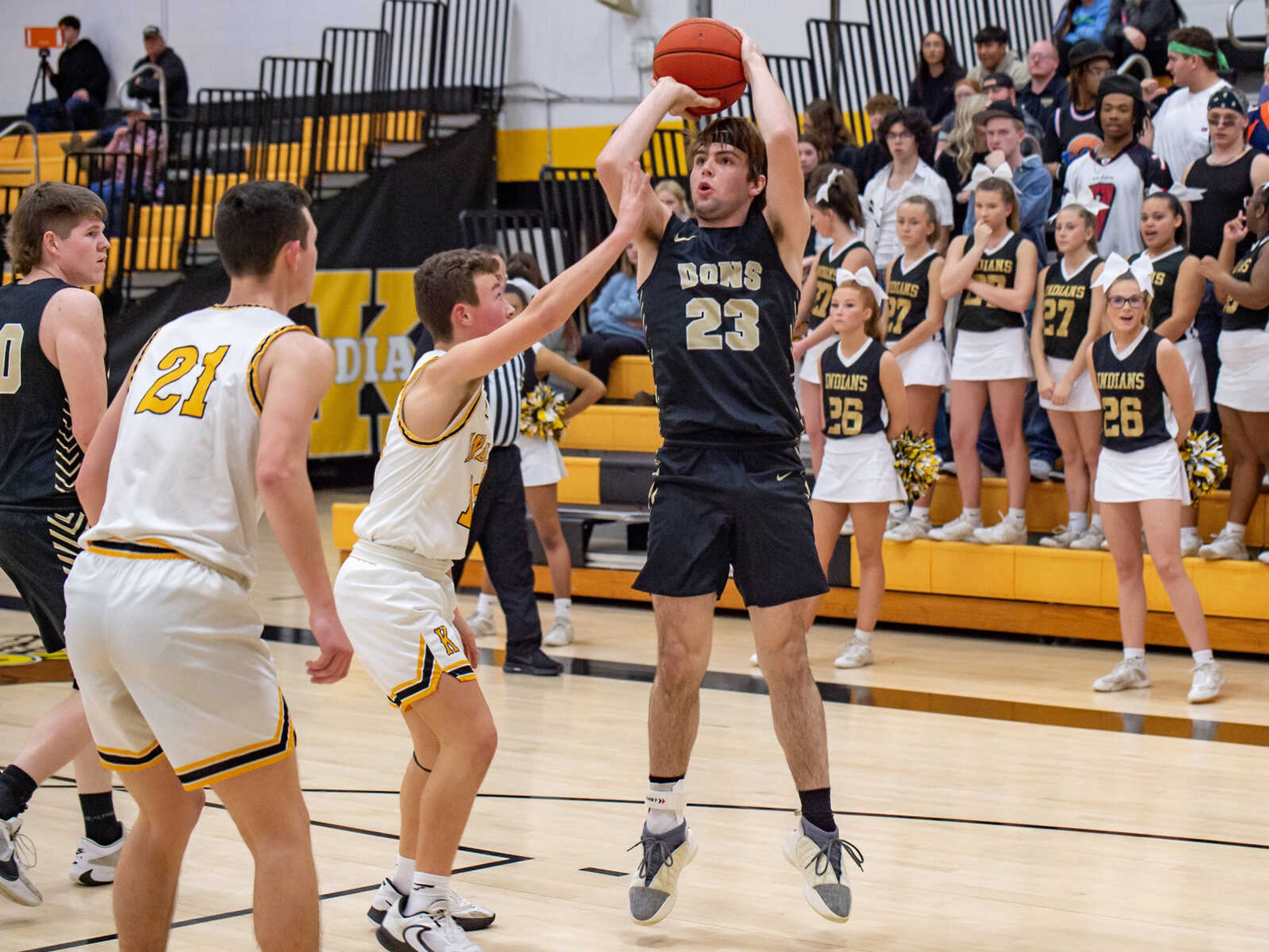 Doniphan's Emmitt Jones (23) takes a contested shot for two points at Kennett Thursday, Feb. 22. 