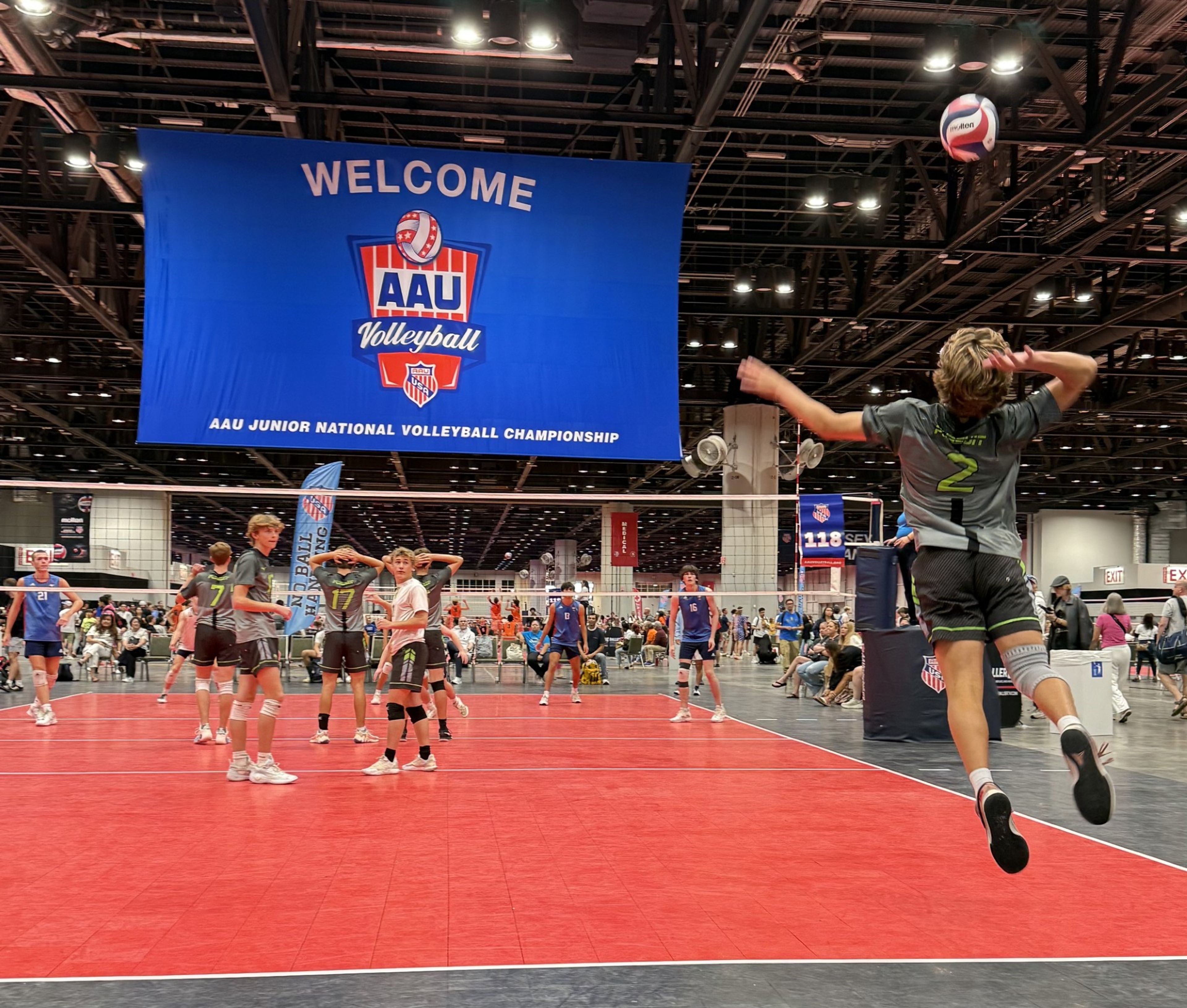 Warren Jones serves the ball for the Pursuit 16u National team during the AAU Junior National Championship semifinals on Thursday, July 3, at the Orange County Convention Center.