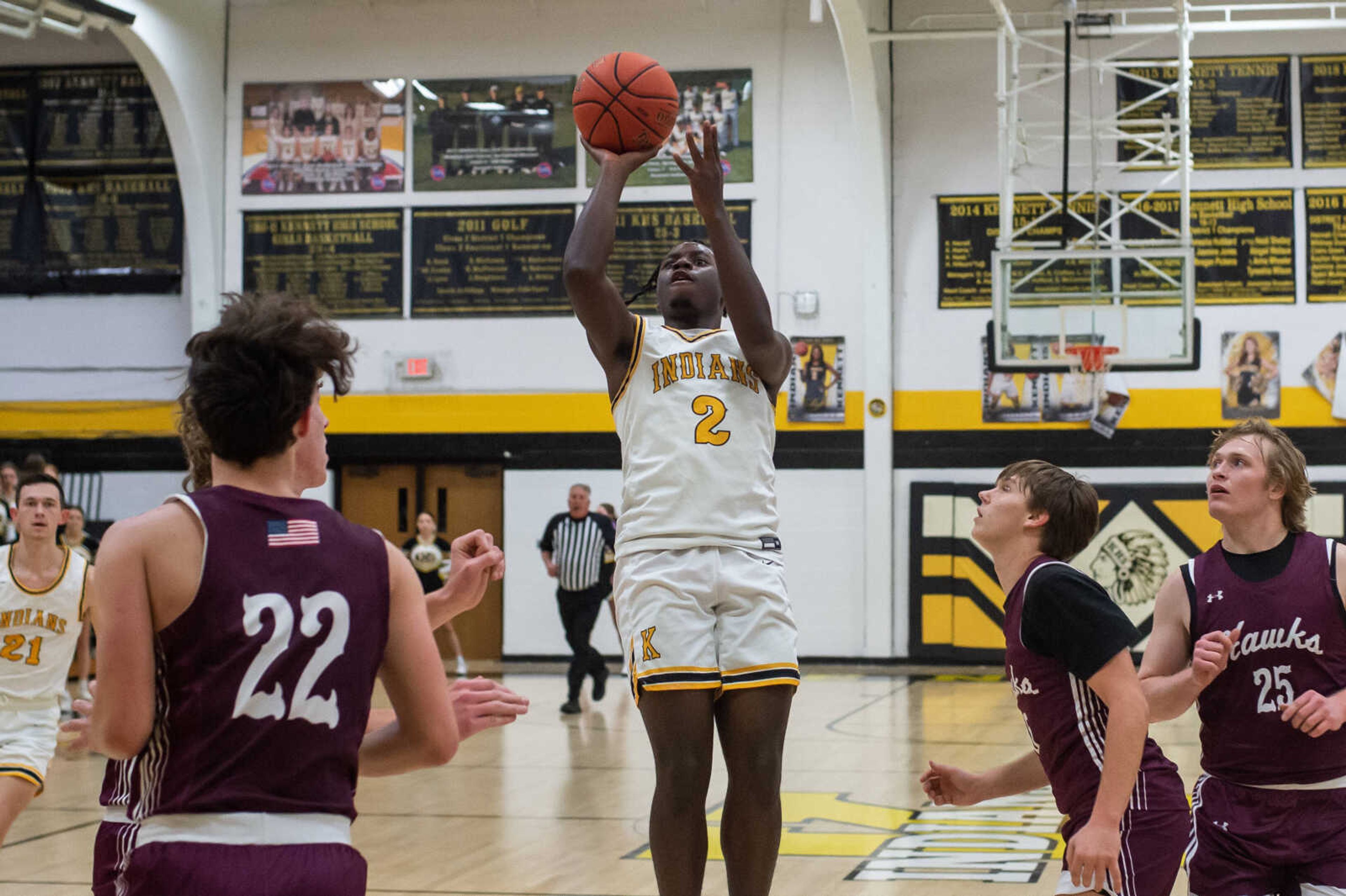 Kennett's Ashton Dismukes attempts a shot for two during a game against Kelly Tuesday, Feb. 13.