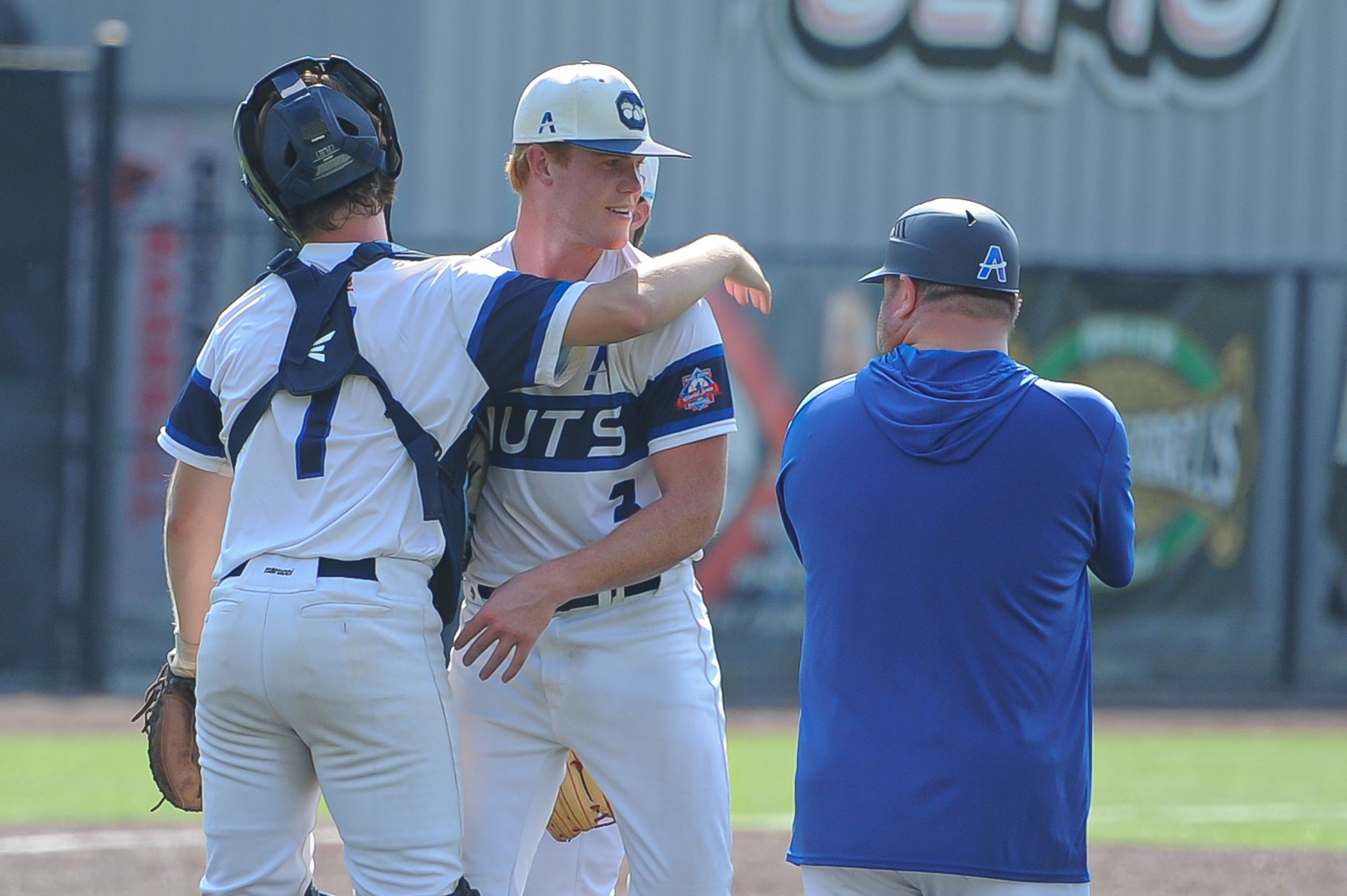 Charleston's Peyton Hodges (center) is ushered off the mound during the August 15, 2024 Babe Ruth World Series third-place game between the Charleston Fighting Squirrels and the Southeast Tropics at Capaha Field in Cape Girardeau, Mo. Southeast defeated Charleston, 11-2 in five innings.