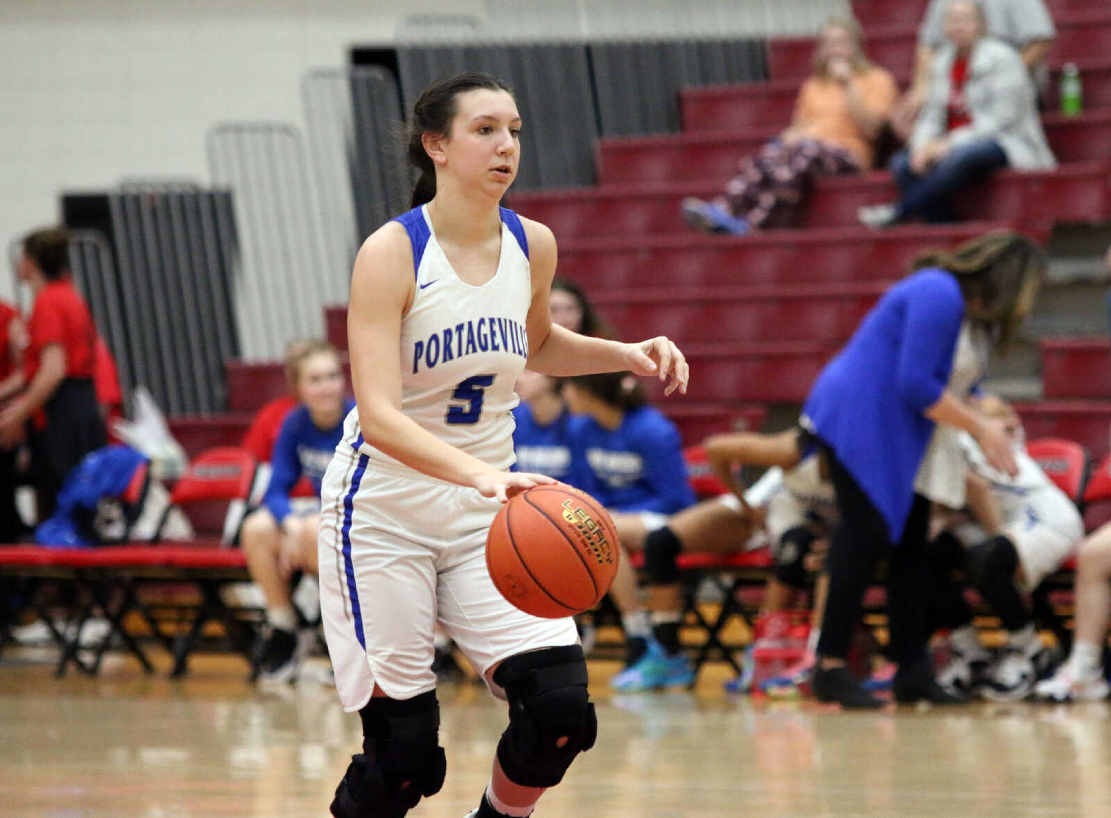 Portageville's Laney Stone (5) dribbles&nbsp;during a 61-25 win over Woodland in a MSHSAA Class 3 Sectional at the Sikeston Fieldhouse on Monday, Feb. 28. (Dennis Marshall/Standard-Democrat)