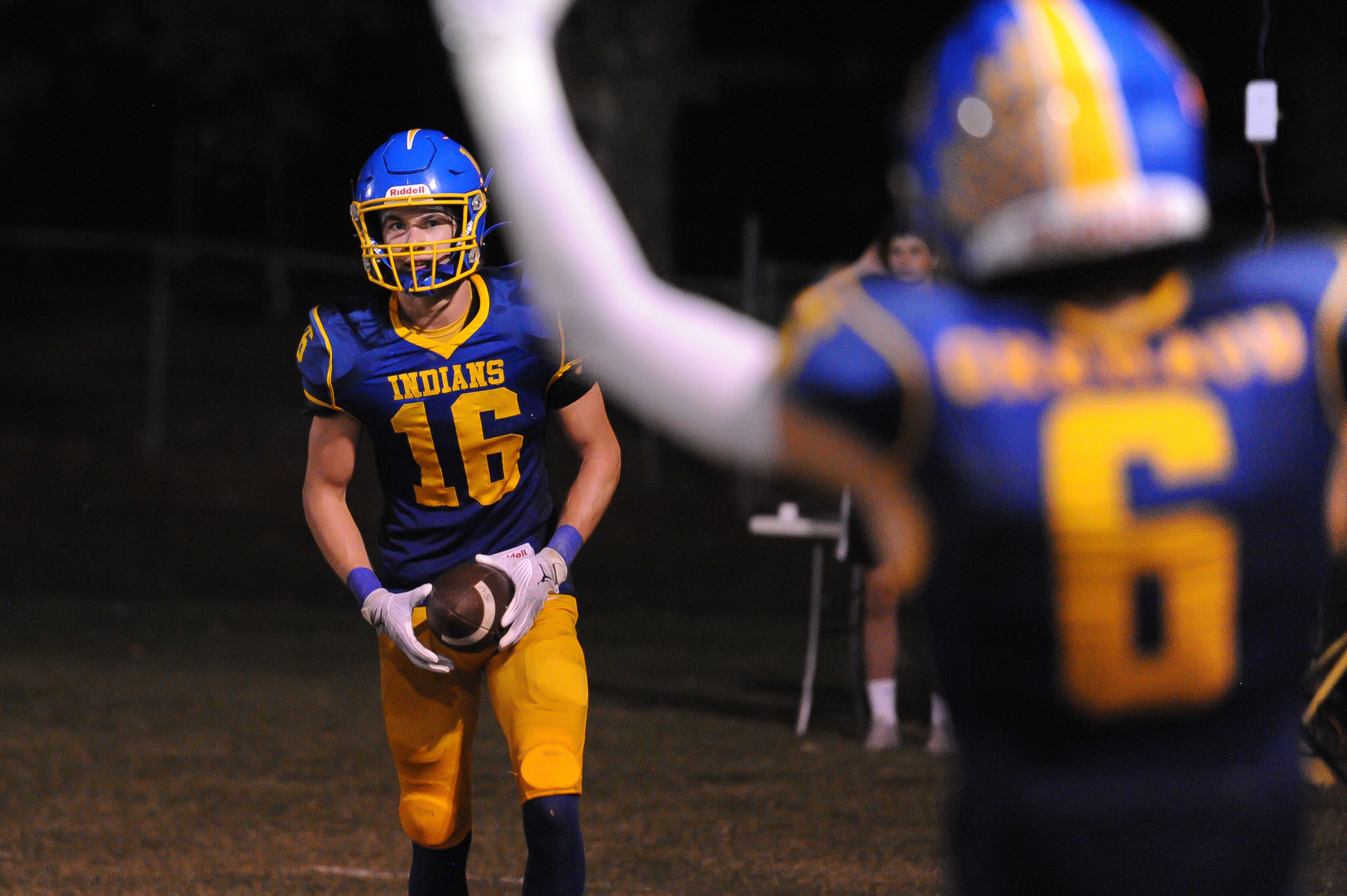 St. Vincent's John Schwartz (left) returns from the end zone while Clayton Gremaud (right) celebrates his touchdown during a Friday, September 20, 2024 game between the St. Vincent Indians and the Herculaneum Blackcats at St. Vincent High School in Perryville, Mo. St. Vincent defeated Herculaneum, 47-7.