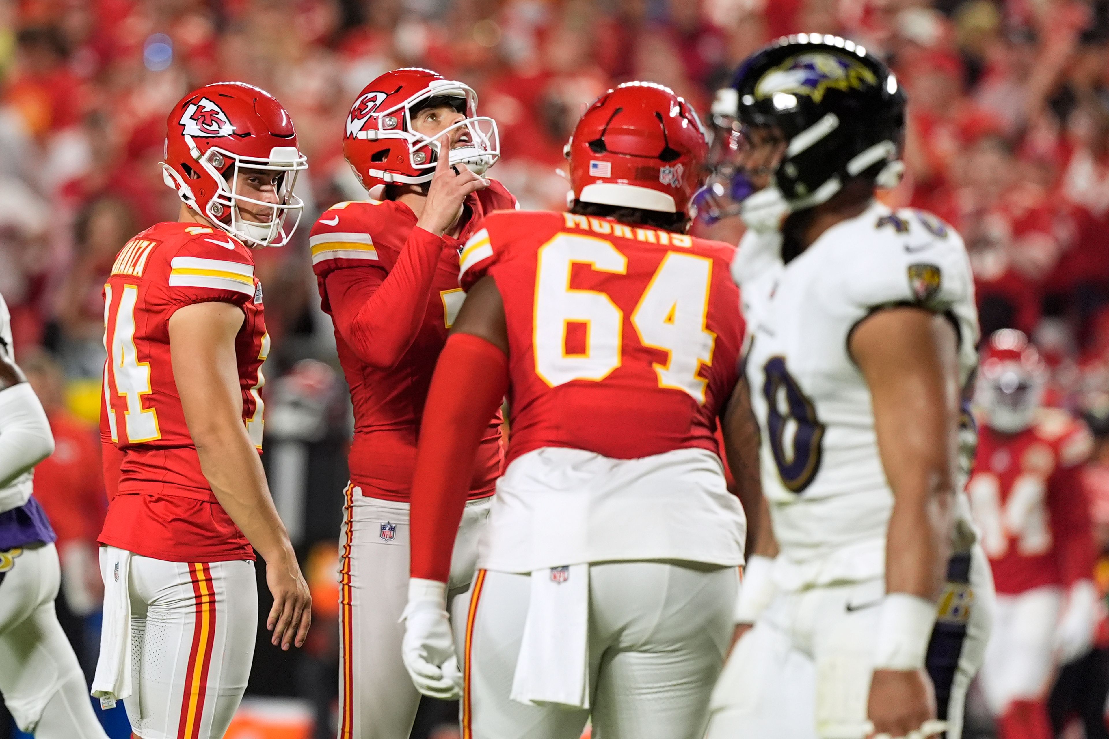 Kansas City Chiefs kicker Harrison Butker celebrates after making a 31-yard field goal during the first half of an NFL football game against the Baltimore Ravens Thursday, Sept. 5, 2024, in Kansas City, Mo. (AP Photo/Charlie Riedel)