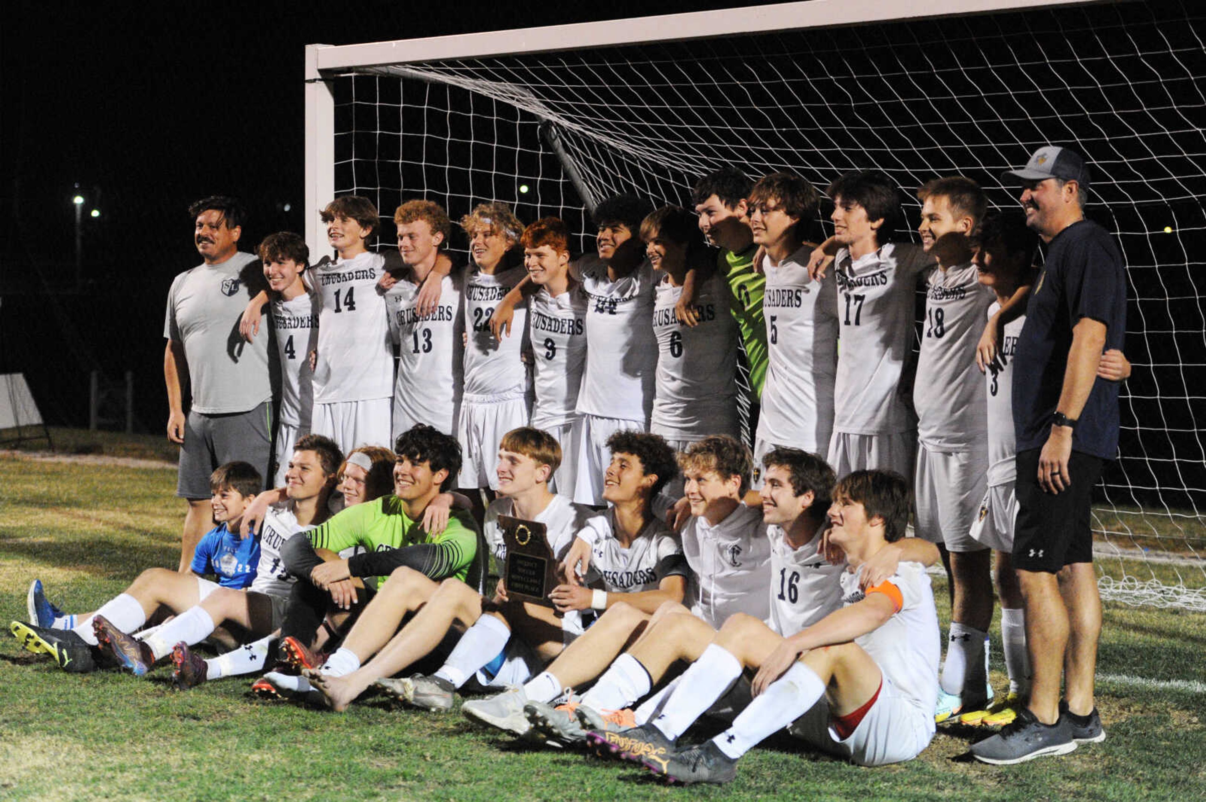 The Saxony Lutheran soccer team poses for a photo after beating Affton on Thursday in the Class 2 District 1 championship at The Bank of Missouri Soccer Complex in Perryville.