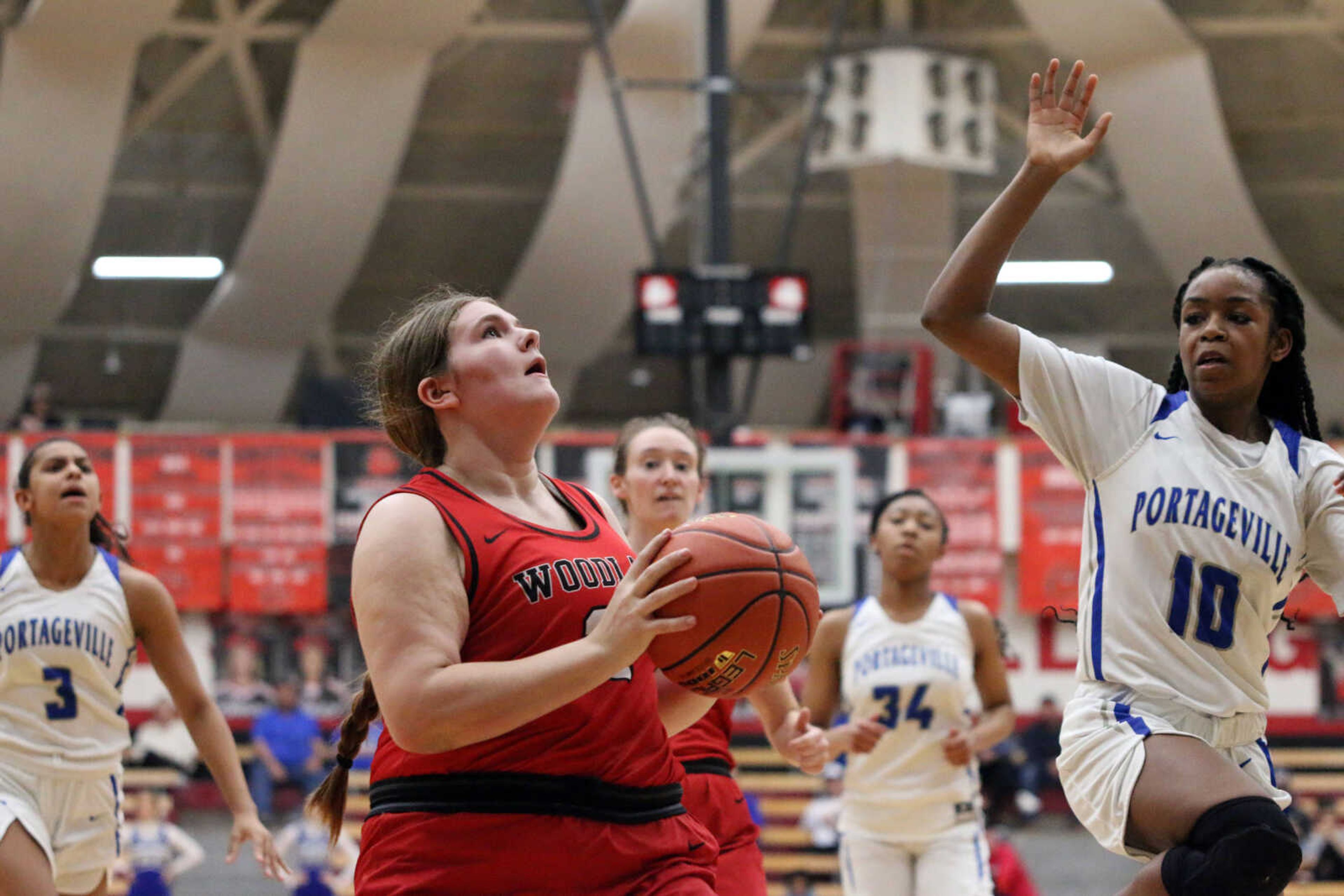 Woodland's Tallie Johnson (21) goes for a layup&nbsp;during a 61-25 loss to Portageville in a MSHSAA Class 3 Sectional at the Sikeston Fieldhouse on Monday, Feb. 28. (Dennis Marshall/Standard-Democrat)