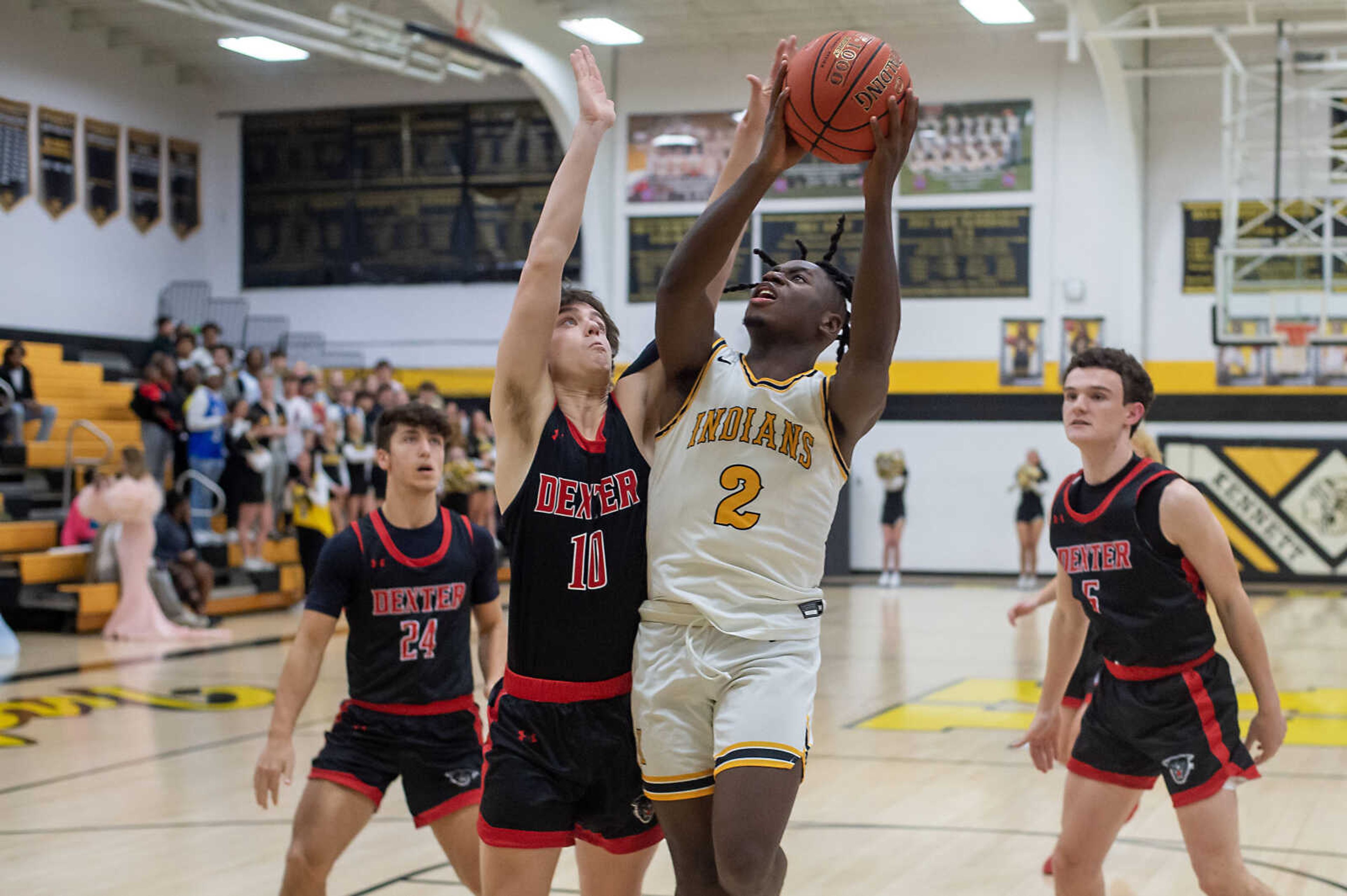 Kennett's Ashton Dismukes attempts a layup during a home game against Dexter Friday, Feb. 9, 2024.