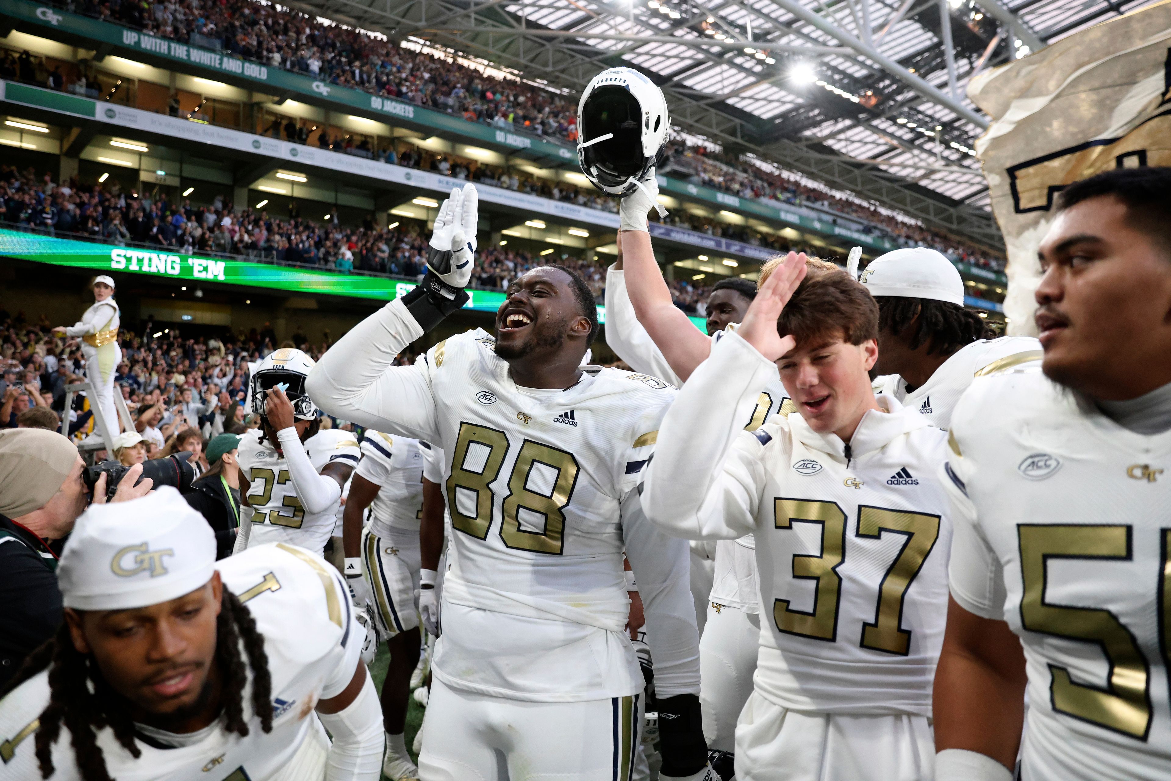 Georgia Tech players celebrate after the NCAA college football game between Georgia Tech and Florida State at the Aviva stadium in Dublin, Saturday, Aug. 24, 2024. (AP Photo/Peter Morrison)