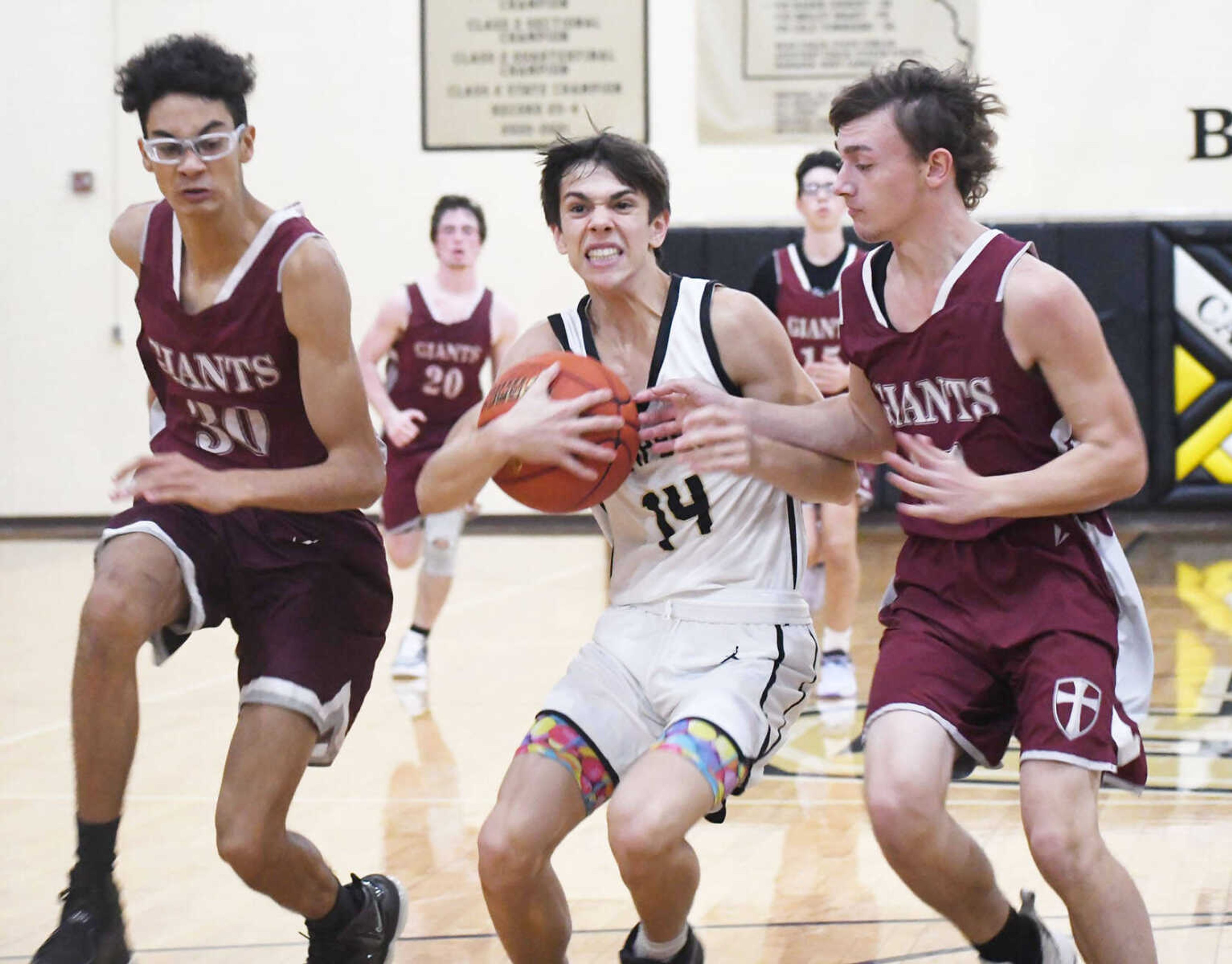 Campbell High School’s Drew Fowler (14) finds himself double-teamed by a pair of St. Paul Lutheran players while on the fastbreak during a jamboree game dated Thursday, Nov. 16, 2023.