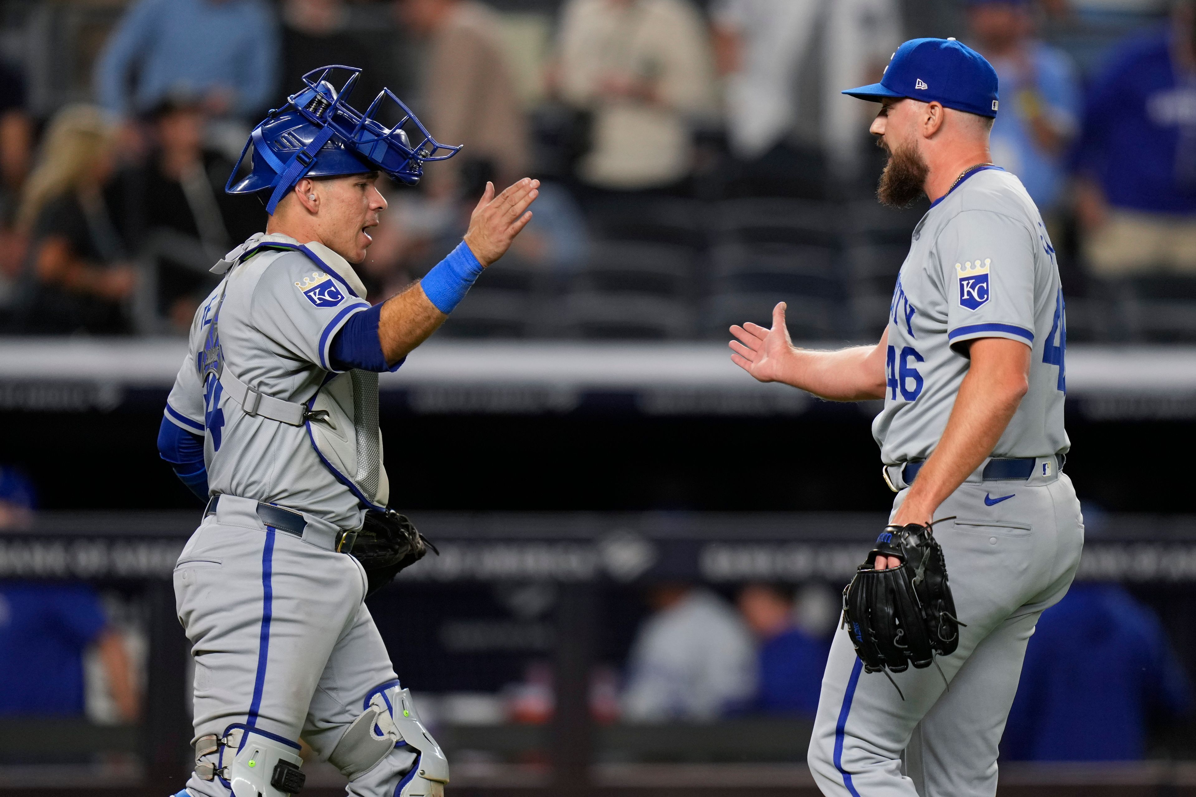 Kansas City Royals catcher Freddy Fermin, left, and pitcher John Schreiber celebrate after a baseball game against the New York Yankees at Yankee Stadium Tuesday, Sept. 10, 2024, in New York. (AP Photo/Seth Wenig)