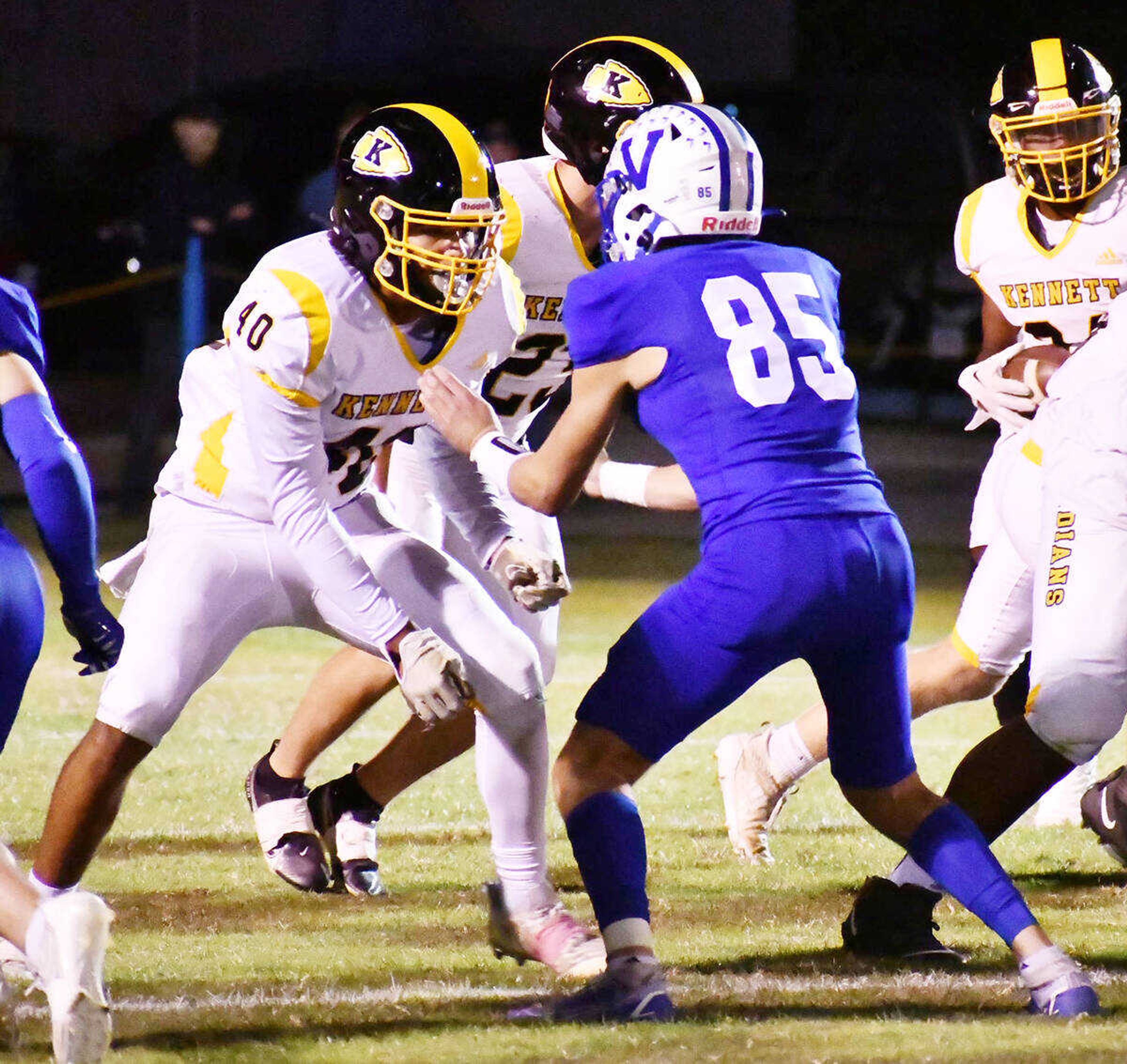 Kennett's Chris Thompson (40) engages the Valle Catholic's Isaac Basler (85) at the point of attack during a football game dated Friday, Oct. 20, at Father John Dempsey Field in Ste. Genevieve.