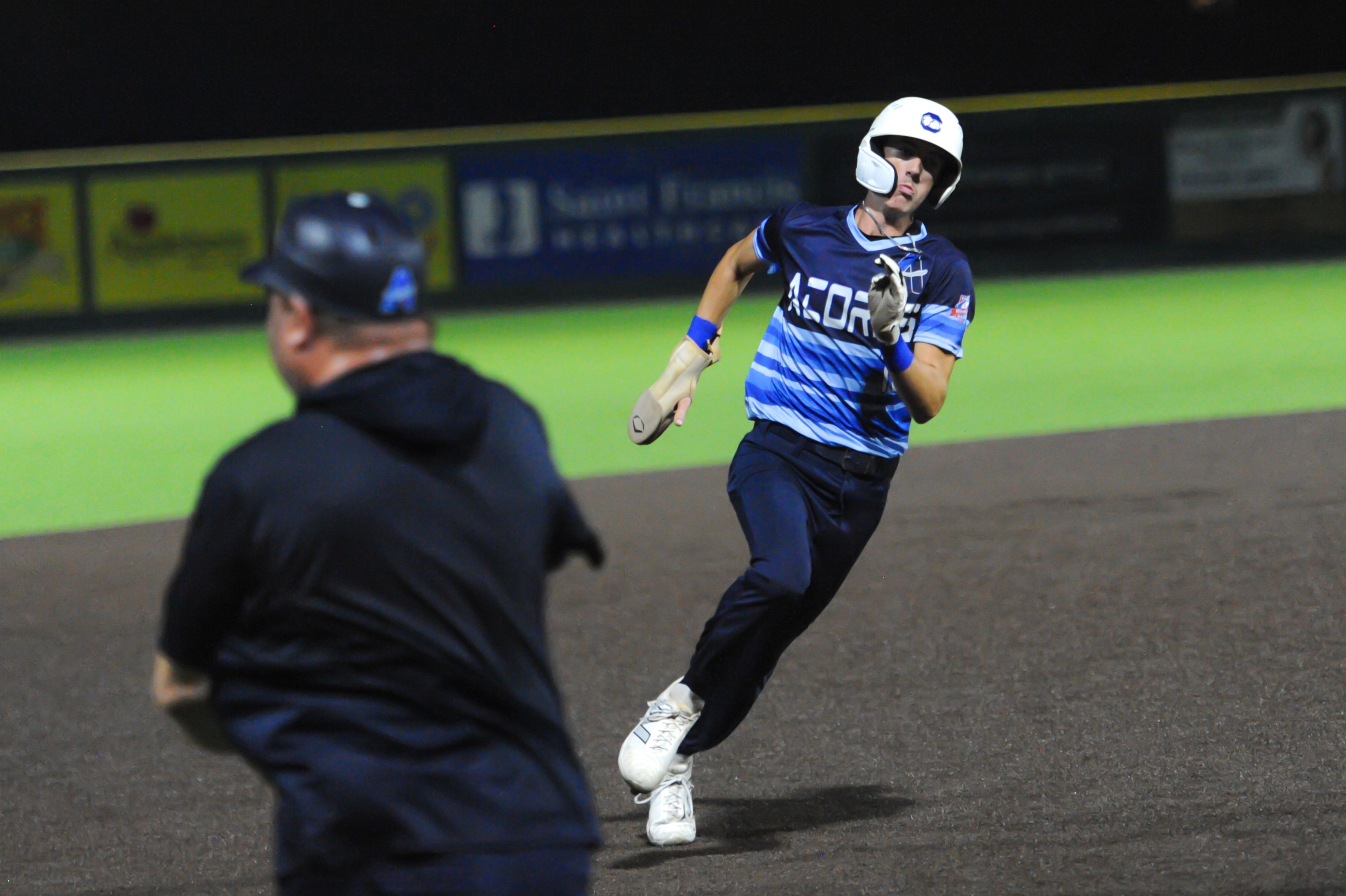 Aycorp's Brady Smith sprints through third base during an August 14, 2024 Babe Ruth World Series game between the Aycorp Fighting Squirrels and the Altoona, Pennsylvania, at Capaha Field in Cape Girardeau, Mo. Aycorp defeated Altoona, 12-11.