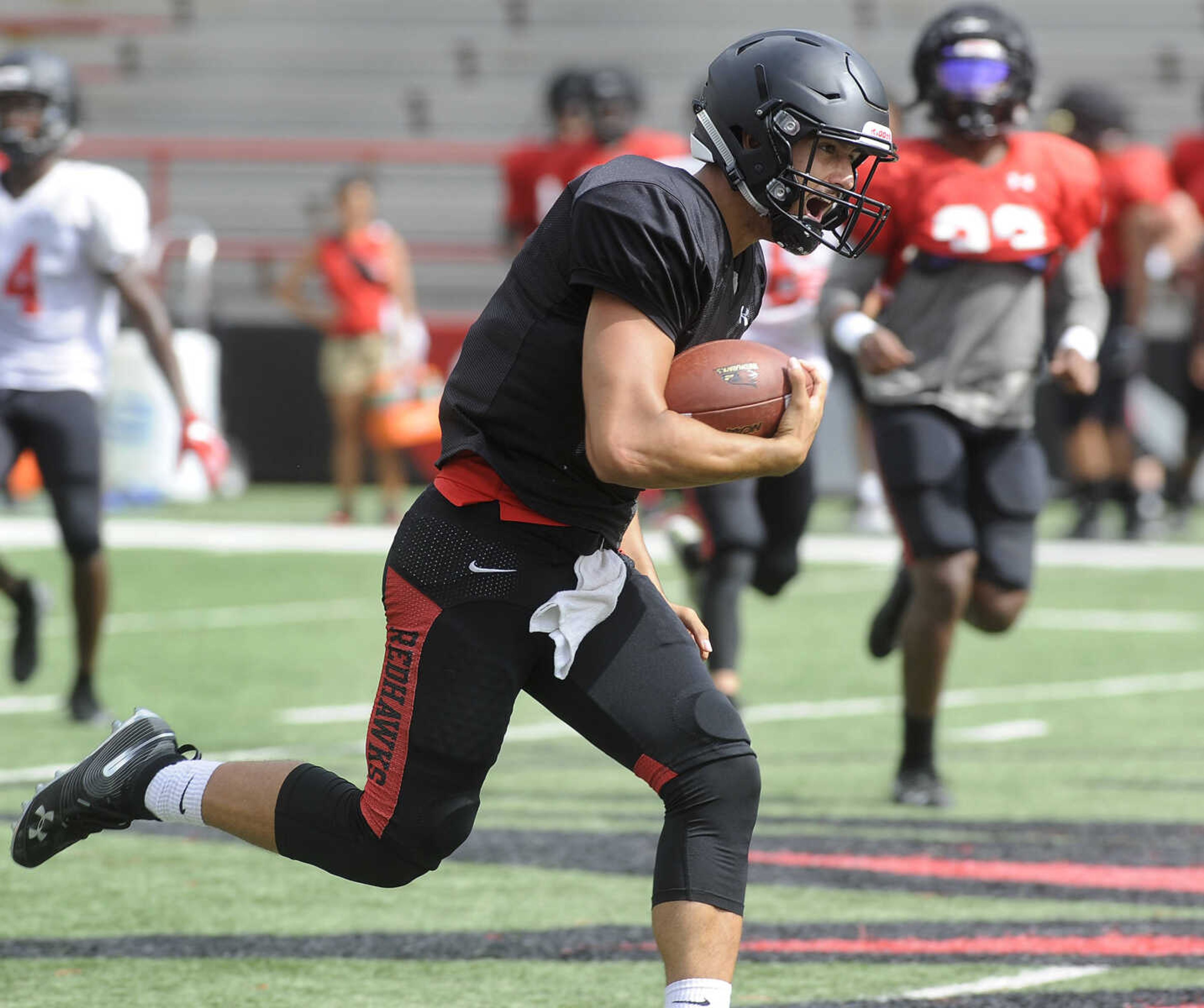 FRED LYNCH ~ flynch@semissourian.com
Southeast Missouri State quarterback Anthony Cooper carries the ball during the last preseason scrimmage Saturday, Aug. 18, 2018 at Houck Field.