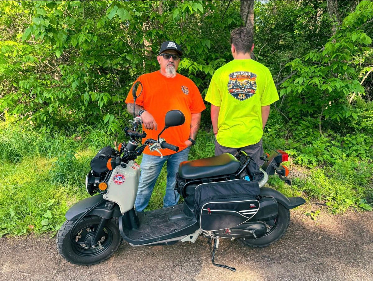 Father, Adopted Son Plan 2,000-Mile Scooter Journey to Highl...