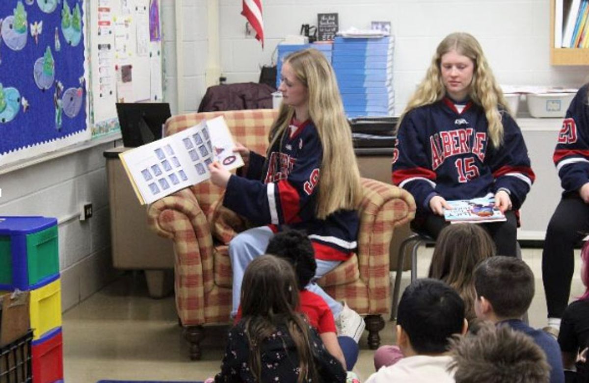 Student-athletes lead literacy effort across elementary schools