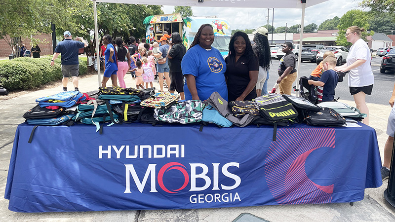 Mobis to give away 250 bookbags