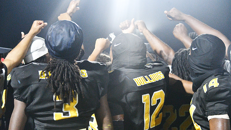 LaFayette Bulldogs quarterback Demetrius Harrington celebrating after a touchdown pass