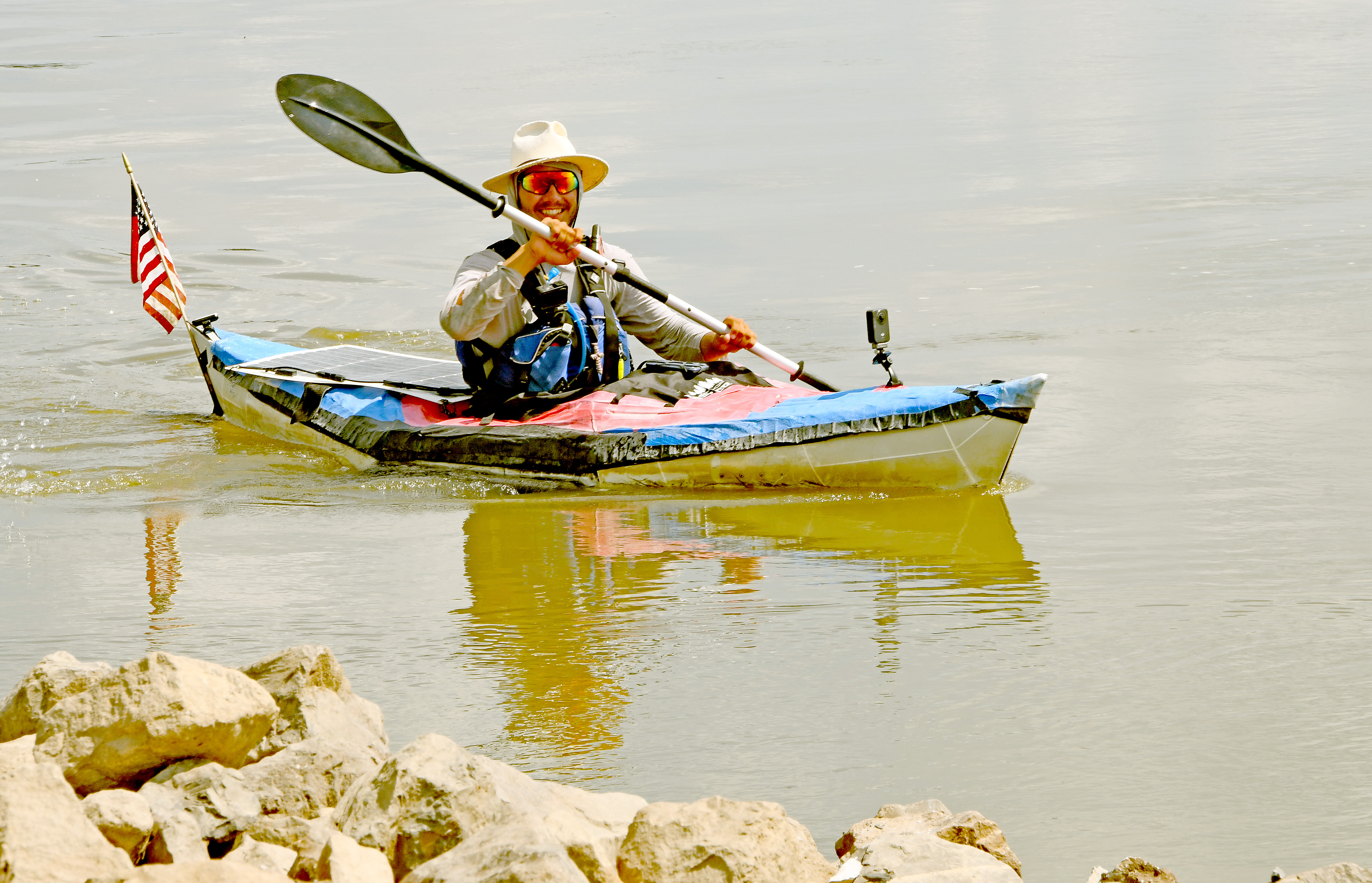 Ian Aitken paddling foldable kayak on Mississippi River adventure expedition