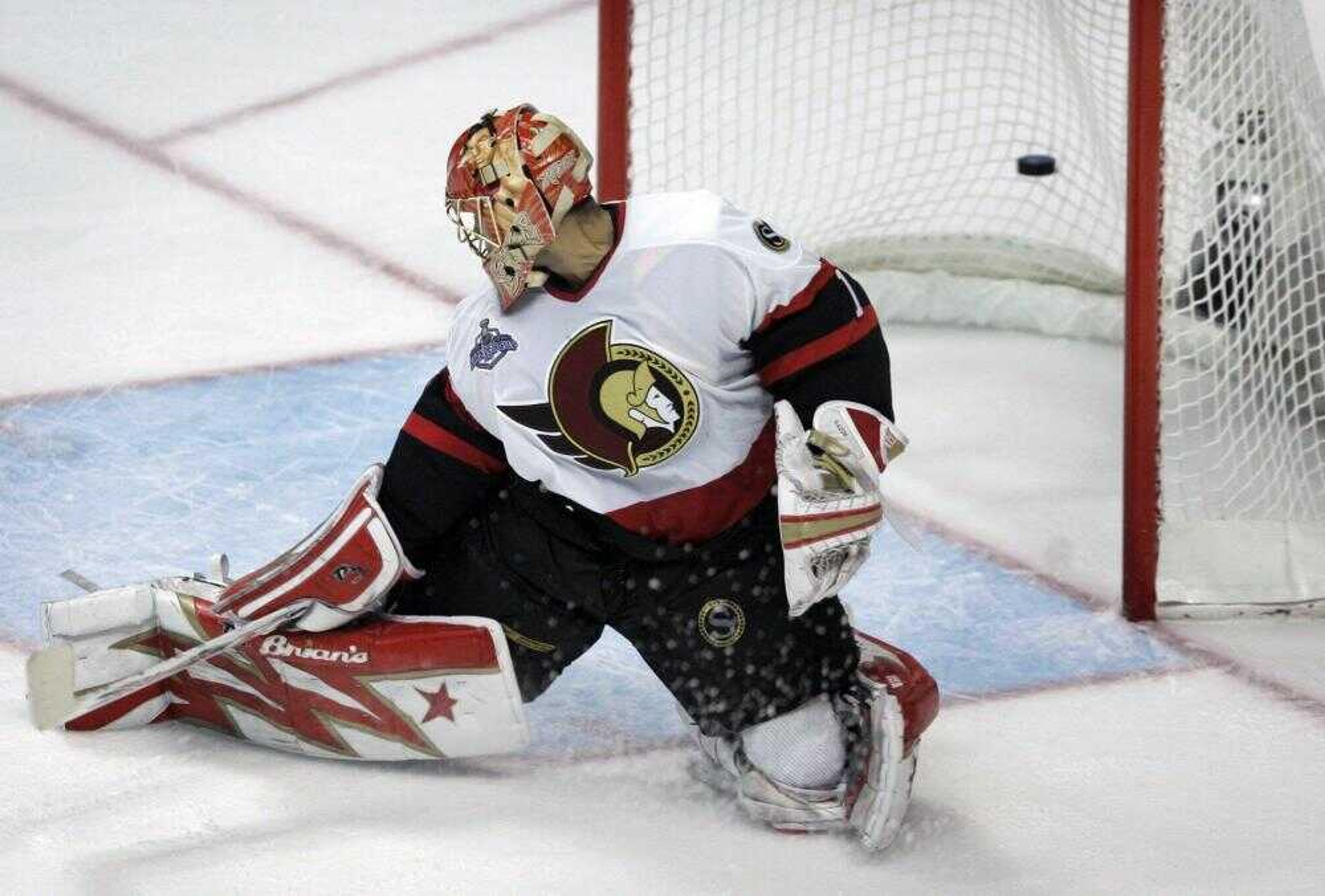 Ottawa Senators goalie Ray Emery could not stop a goal by Anaheim Ducks center Samuel Pahlsson during the third period Wednesday in Anaheim, Calif. (Mark J. Terrill ~ Associated Press)