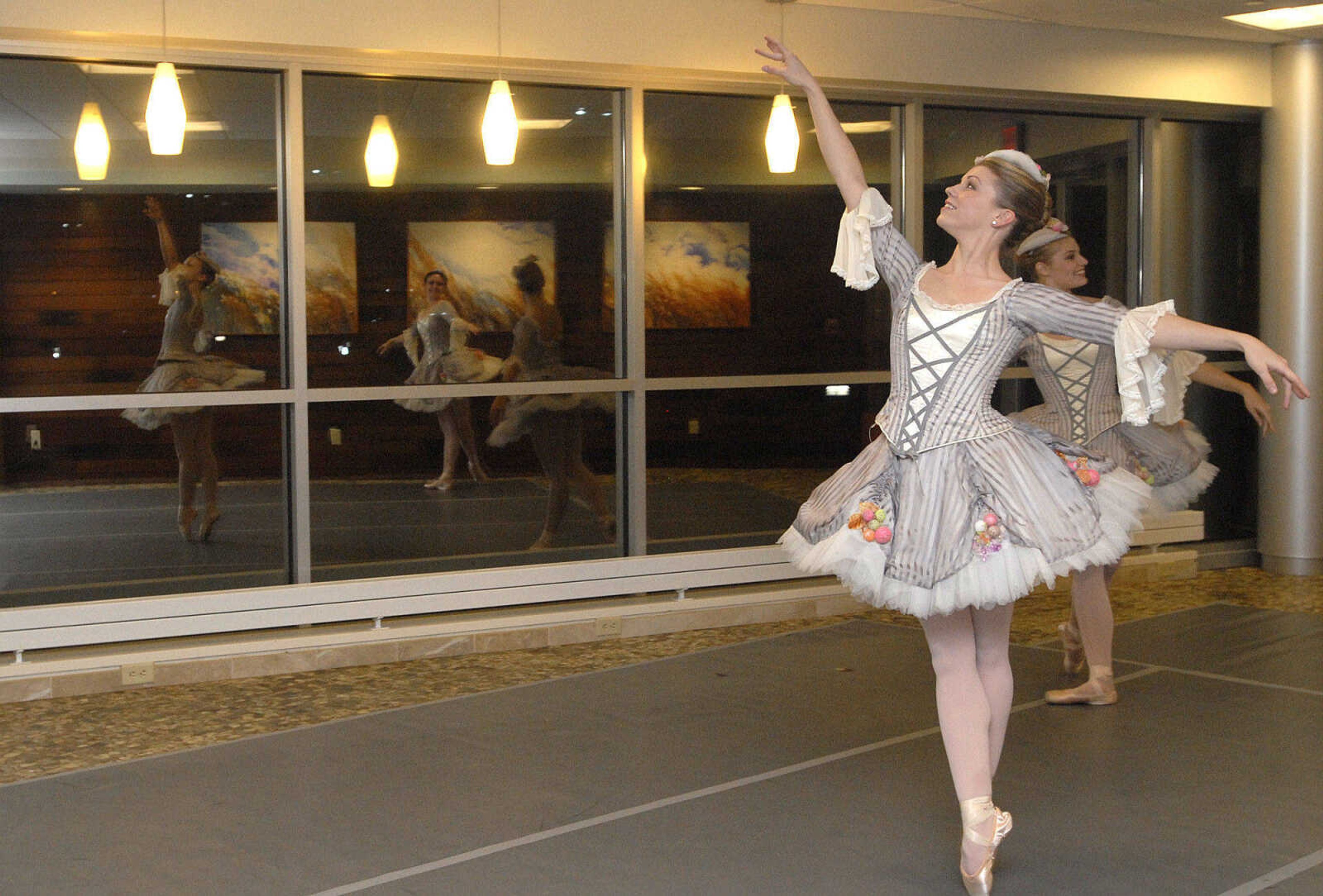 LAURA SIMON ~ lsimon@semissourian.com
Grace Austin, Lauren McCart, and Rachel Klisavage of the Missouri Ballet Theatre from St. Louis, Mo. perform an excerpt from "The Nutcracker" at the Southeast Cancer Center in Cape Girardeau Wednesday, October 26, 2011 during the annual meeting and fundraiser for the Arts Council of Southeast Missouri, sponsored by SoutheastHealth.