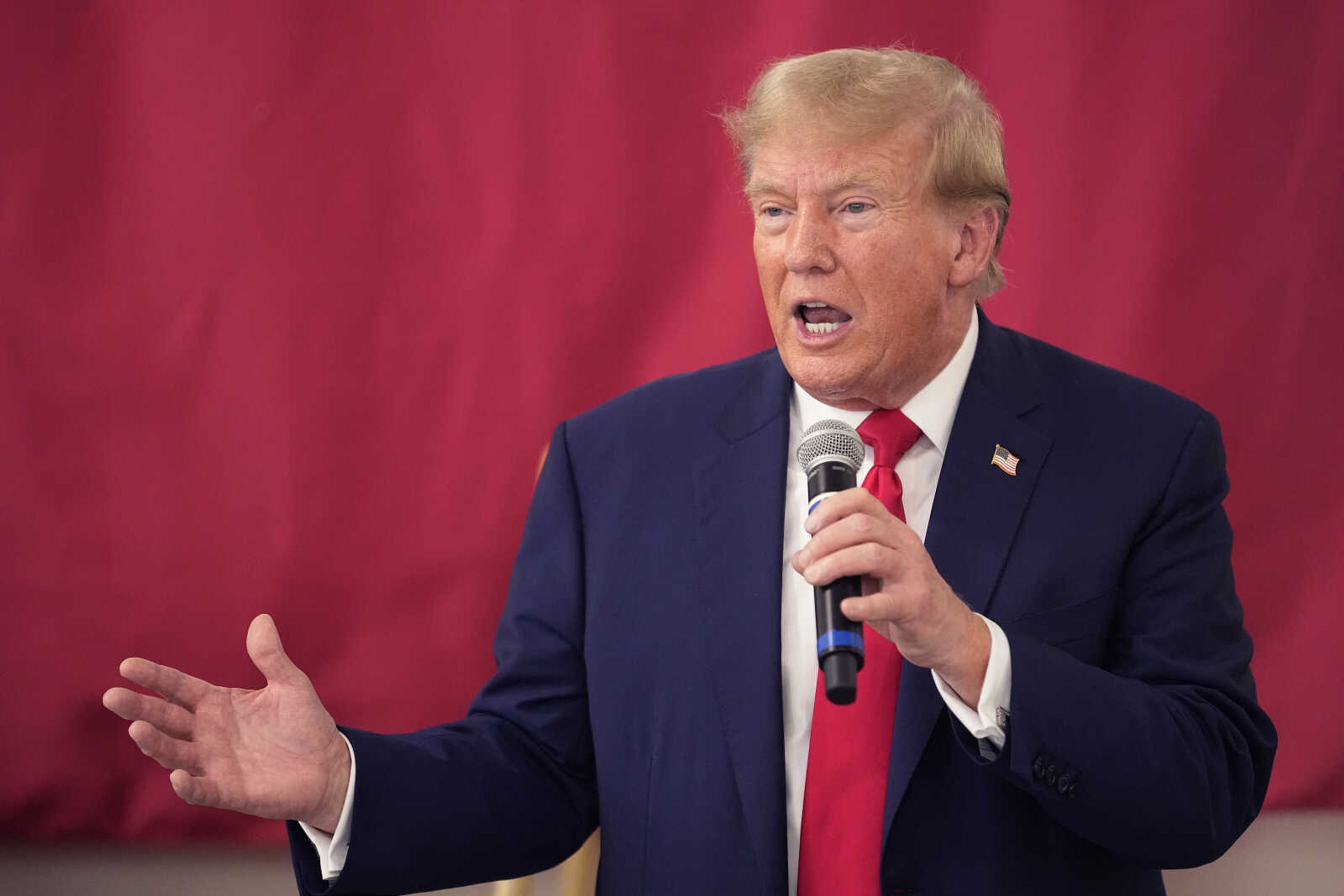 Republican presidential candidate and former President Donald Trump speaks to Texas state troopers and guardsmen at the South Texas International Airport on Sunday in Edinburg, Texas.