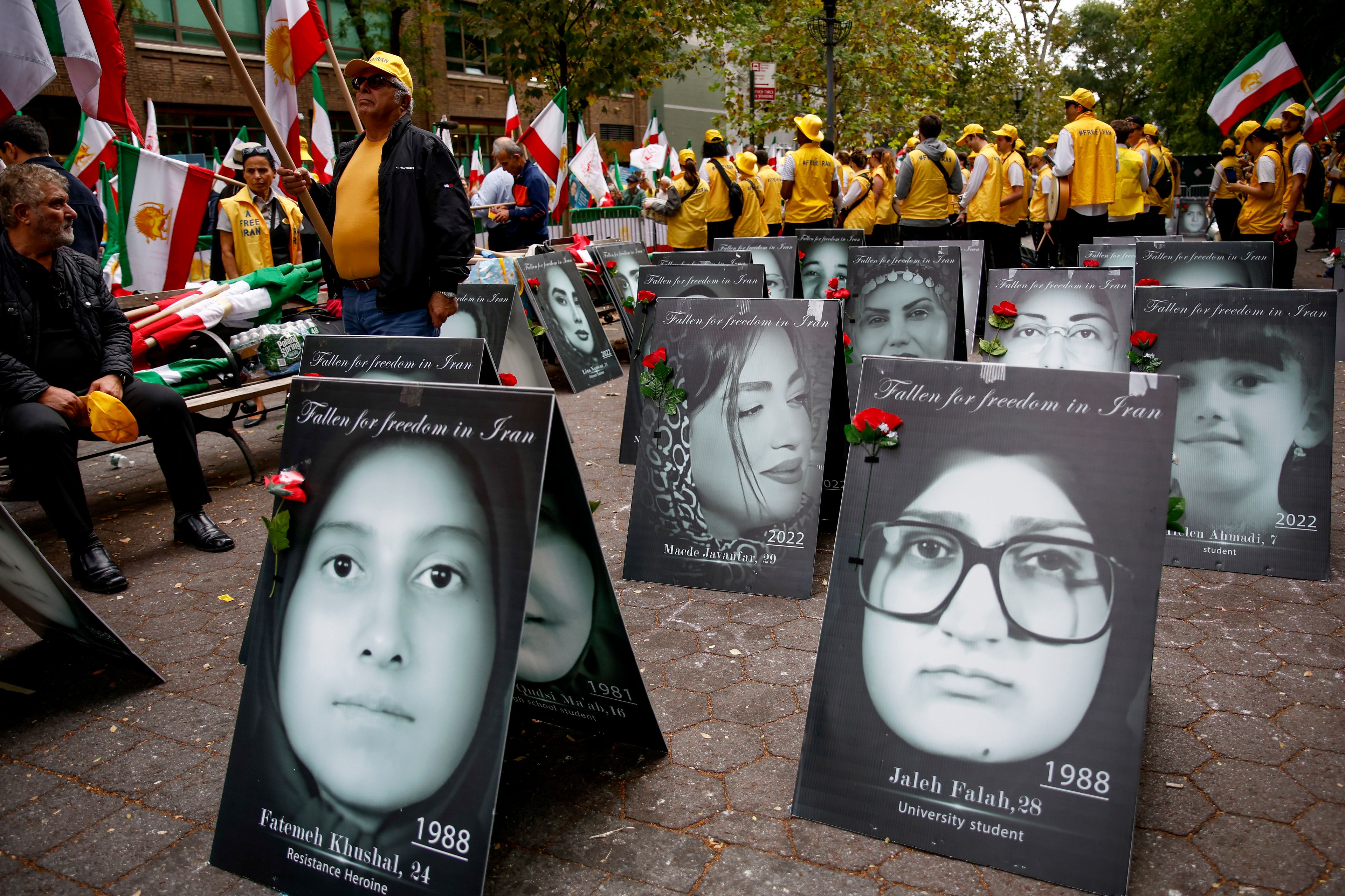 Demonstrators protest, Tuesday, Sept. 24, 2024, in New York, outside United Nations headquarters against the Iranian regime amidst portraits of women executed by the Iranian government. (AP Photo/Stefan Jeremiah)