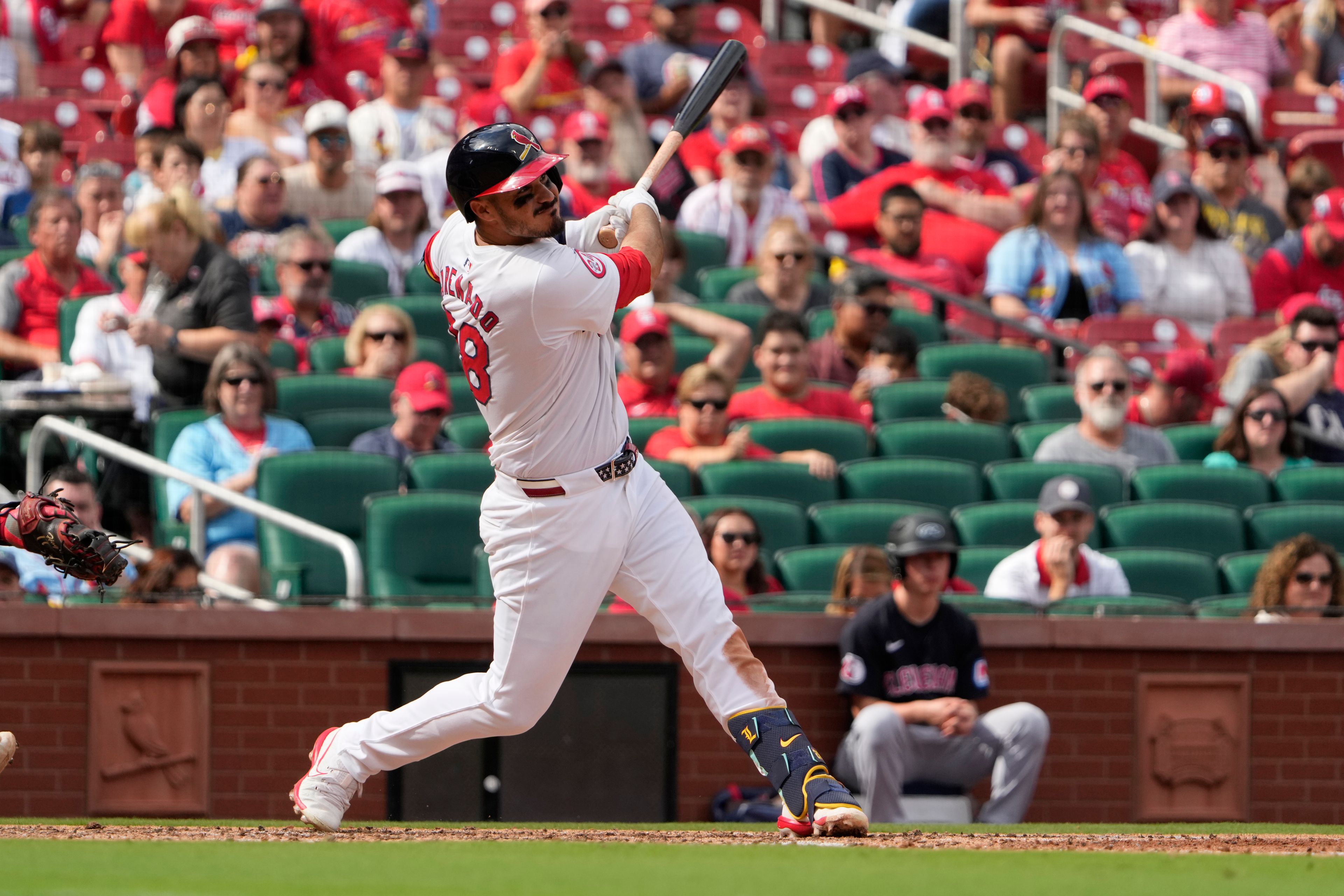 St. Louis Cardinals' Nolan Arenado hits an RBI single during the sixth inning of a baseball game against the Cleveland Guardians Sunday, Sept. 22, 2024, in St. Louis. (AP Photo/Jeff Roberson)