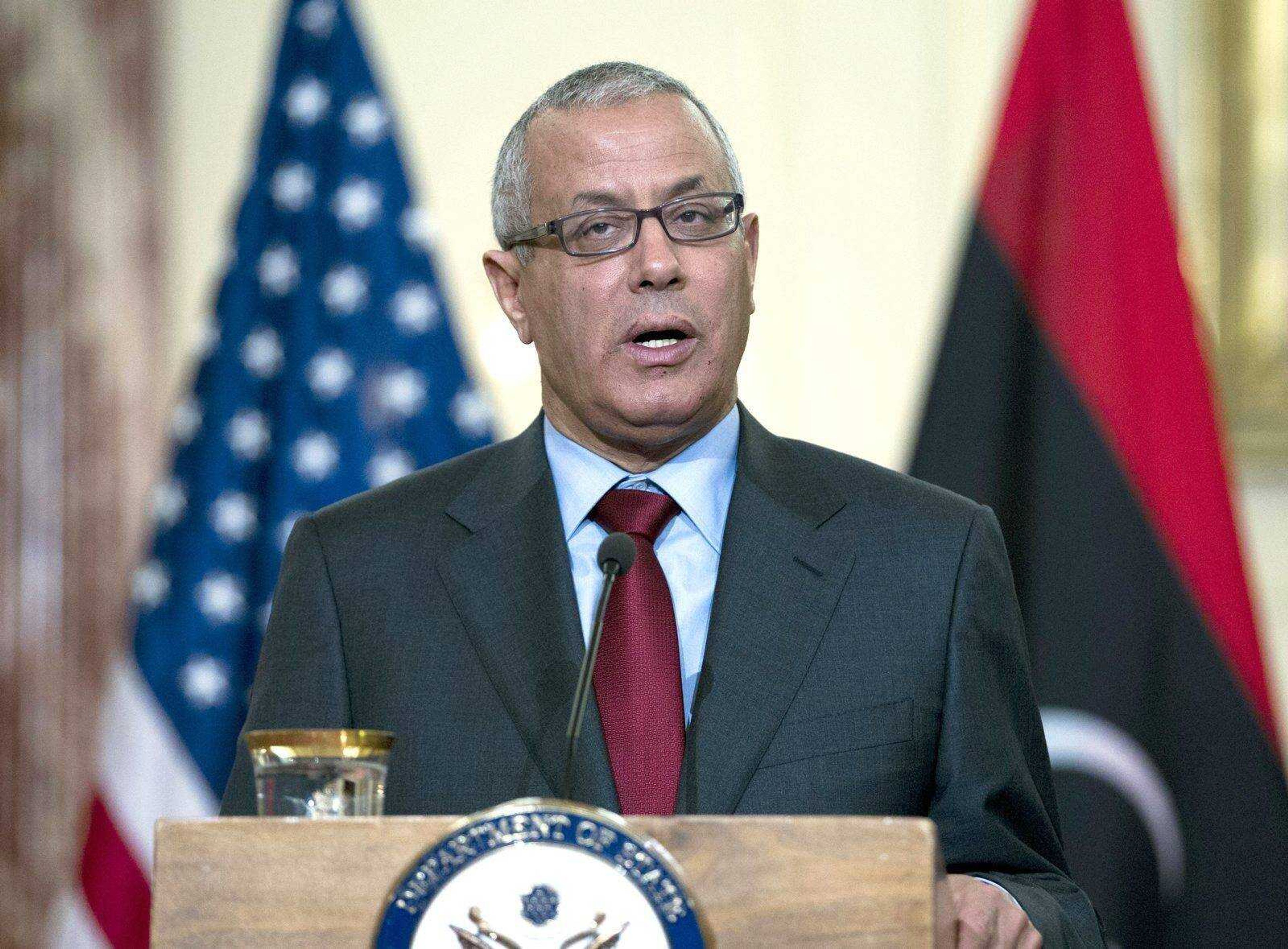 Libyan Prime Minister Ali Zidan speaks during a joint news conference with U.S. Secretary of State John Kerry on March 13 at the State Department in Washington. (Jose Luis Magana ~ Associated Press)