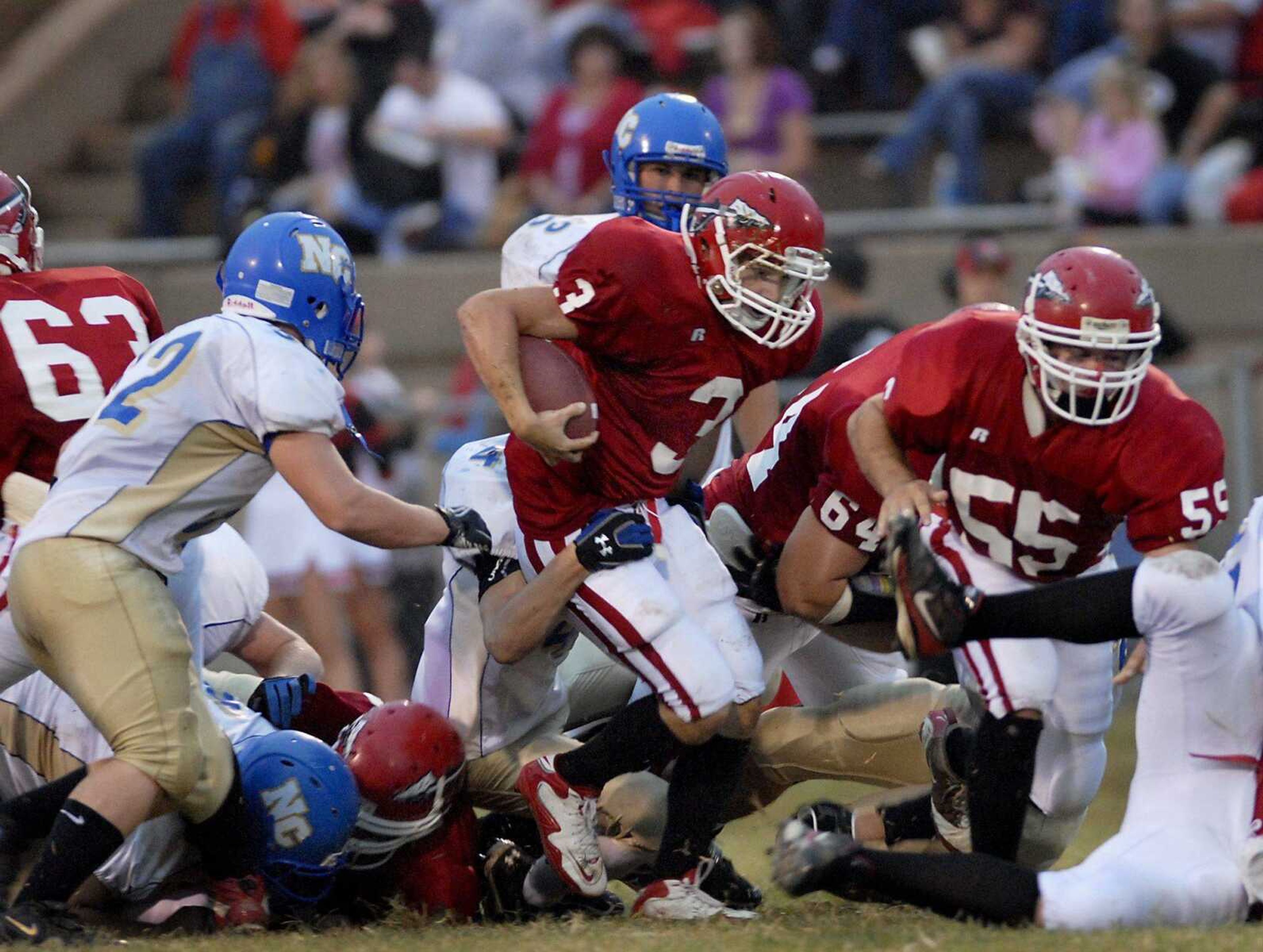 Jackson running back Ethan Ruch runs through the tackles of North County defenders during the first quarter of Friday's game in Jackson. (Kristin Eberts)