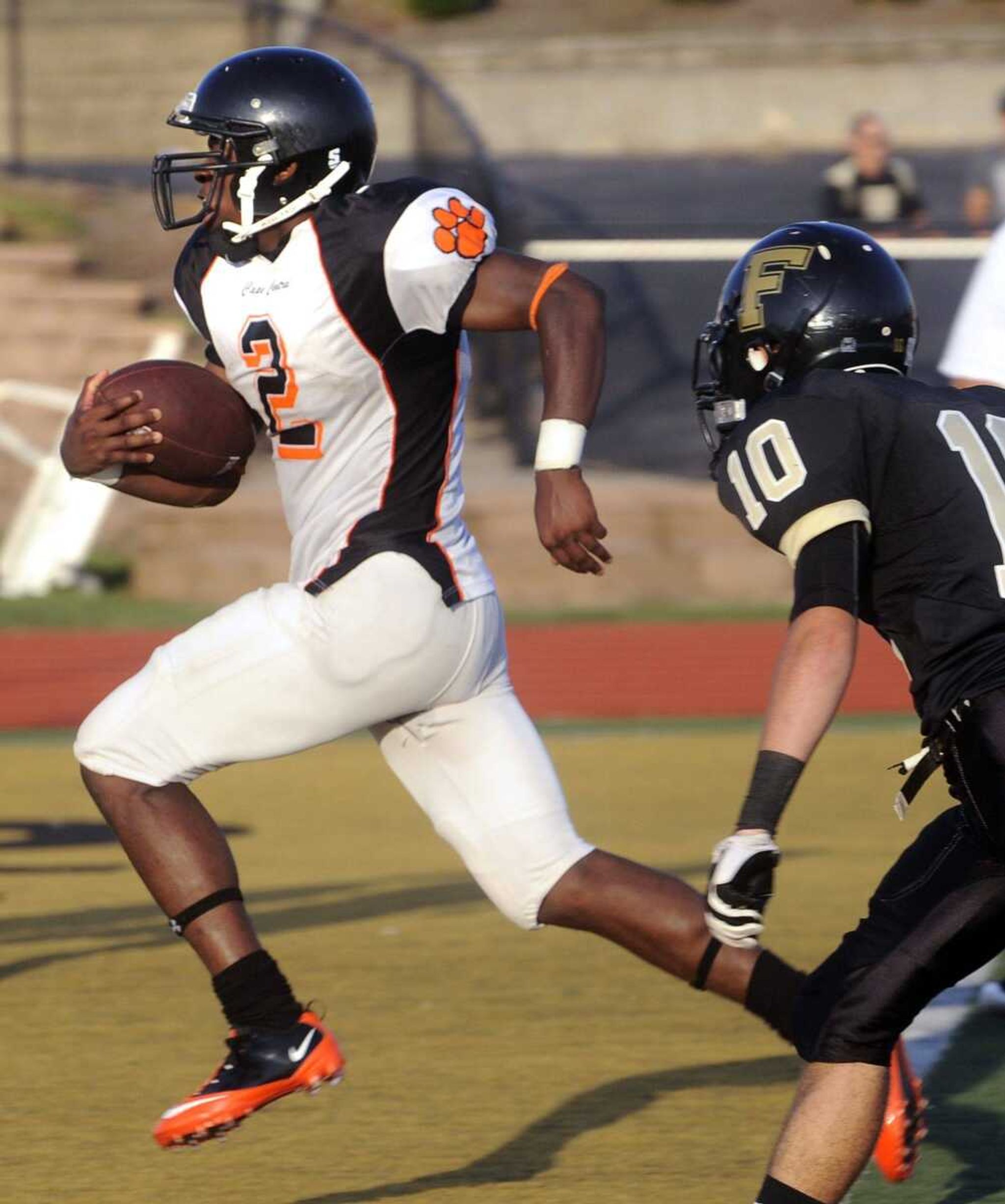 LEFT: Central's Jacob Campbell runs for a 35-yard touchdown against Farmington at the jamboree. (ABOVE: Central defensive back Chris Martin tackles Jackson quarterback Lowgn Wren during the jamboree Friday in Farmington, Mo.)