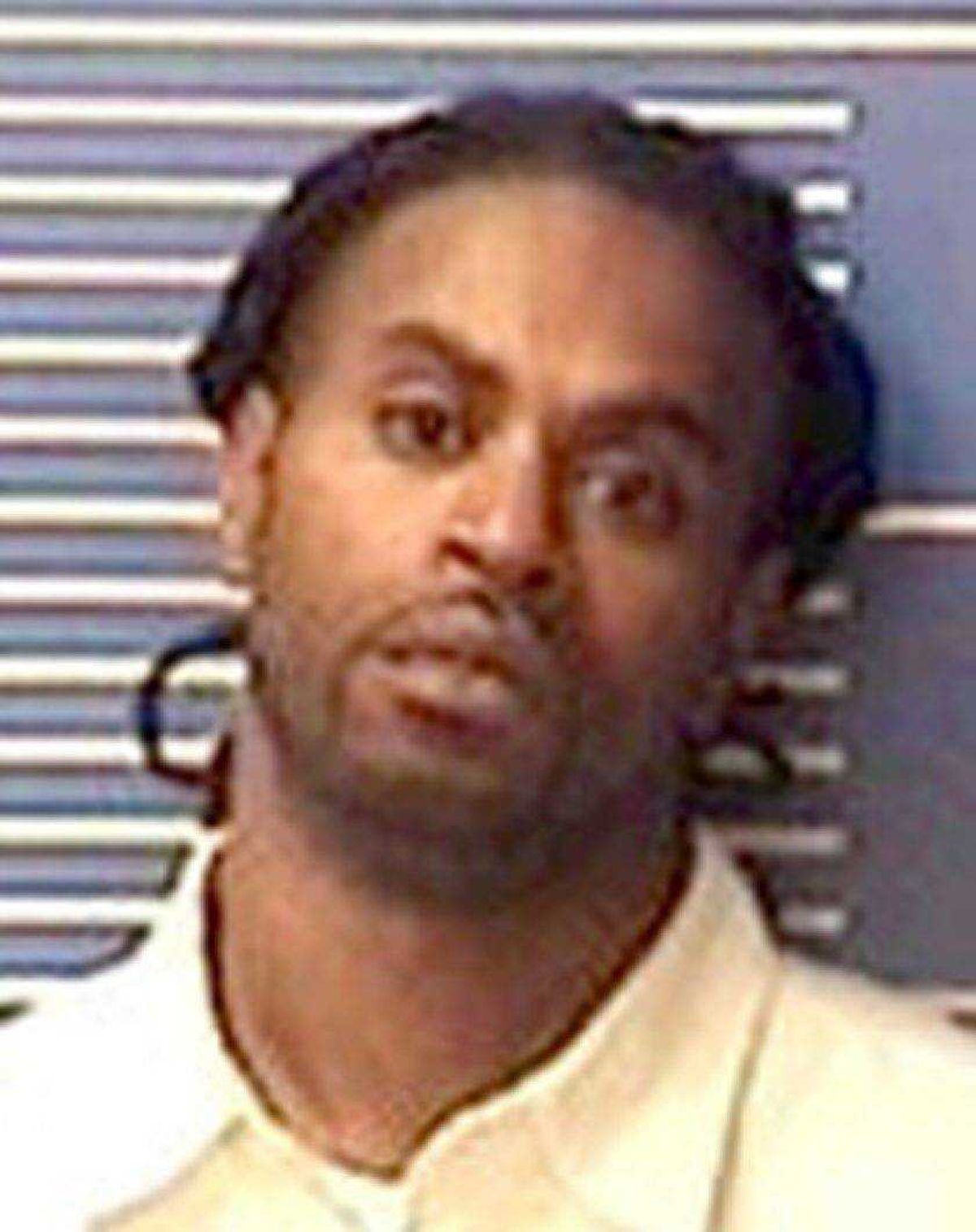 Murder suspect turns himself in to custody