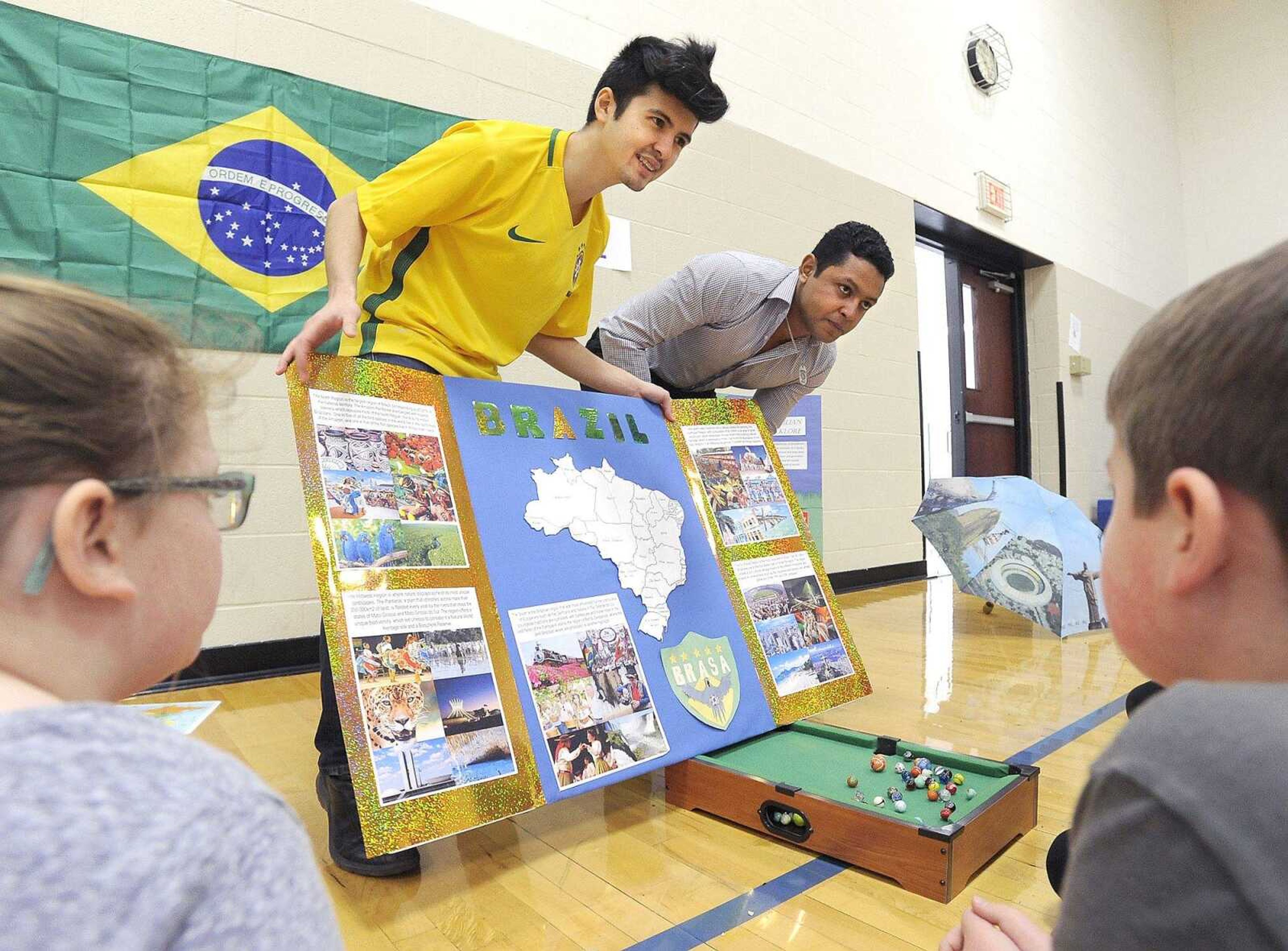 Ricardo Ashimi, left, and Marlon Amorim, natives of Brazil, talk about their country Wednesday, Feb. 1, 2017 at Oran Elementary School in Oran, Missouri.