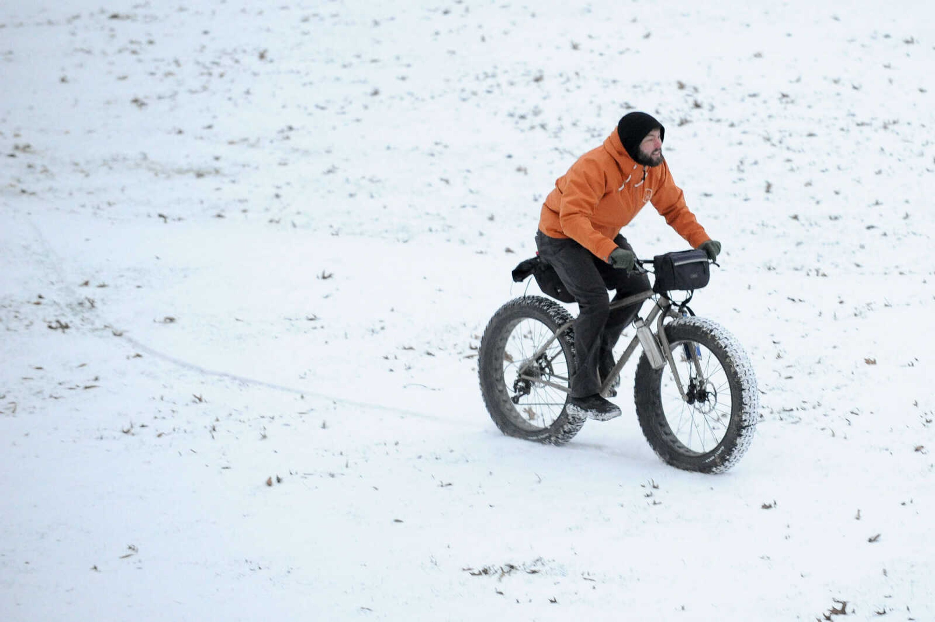 GLENN LANDBERG ~ glandberg@semissourian.com


Pierce Yates takes his fat bike for a ride in the snow outside Academic Hall on the campus of Southeast Missouri State University Wednesday, Jan. 20, 2016.