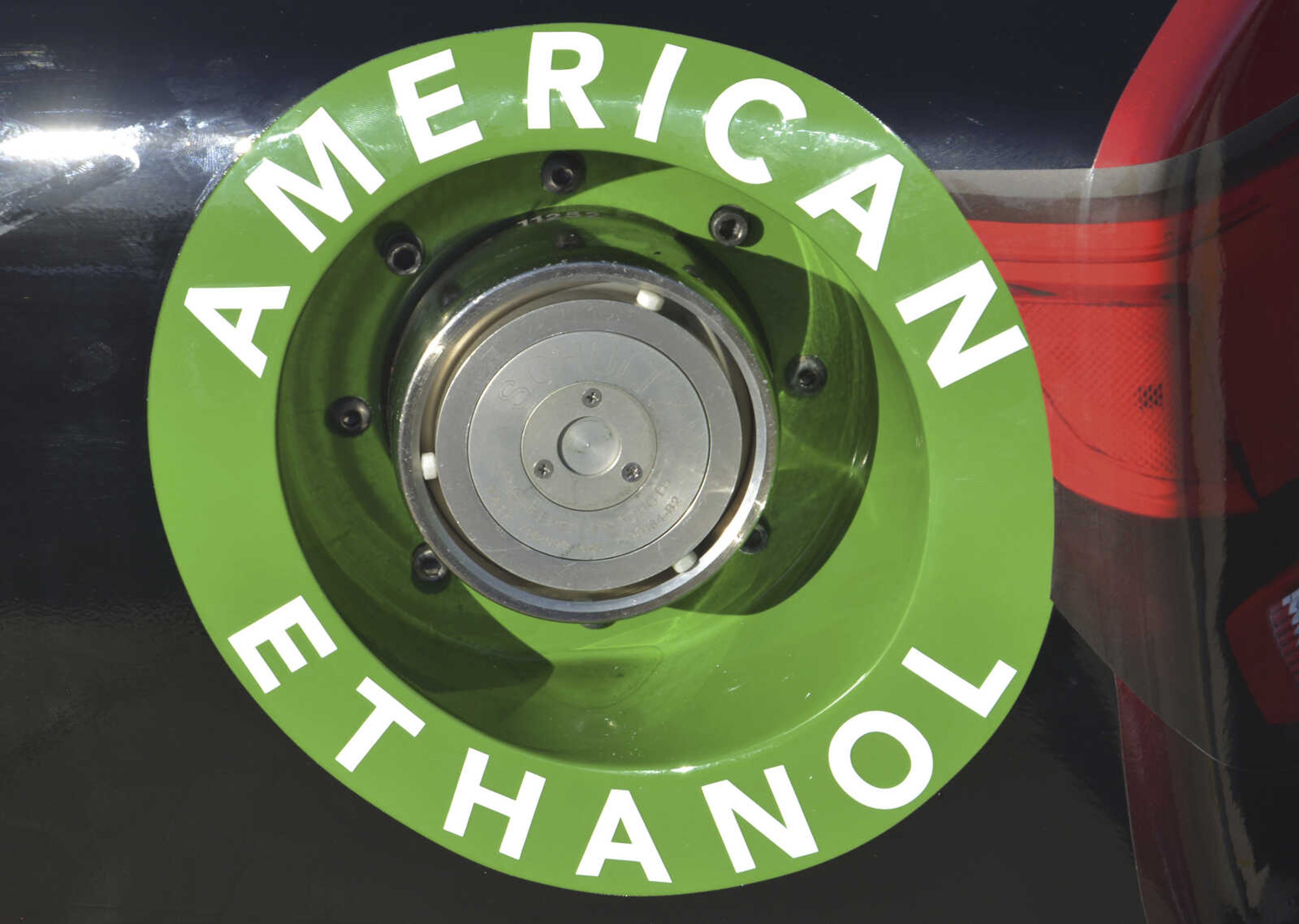 FILE - An American Ethanol label is shown on a NASCAR race car gas tank at Texas Motor Speedway in Fort Worth, Texas, Nov. 1, 2014. Gasoline with higher blends of ethanol could be sold year-round in eight Midwestern states beginning in 2024 under a rule proposed Wednesday, March 1, 2023, by the Environmental Protection Agency. (AP Photo/Randy Holt, File)