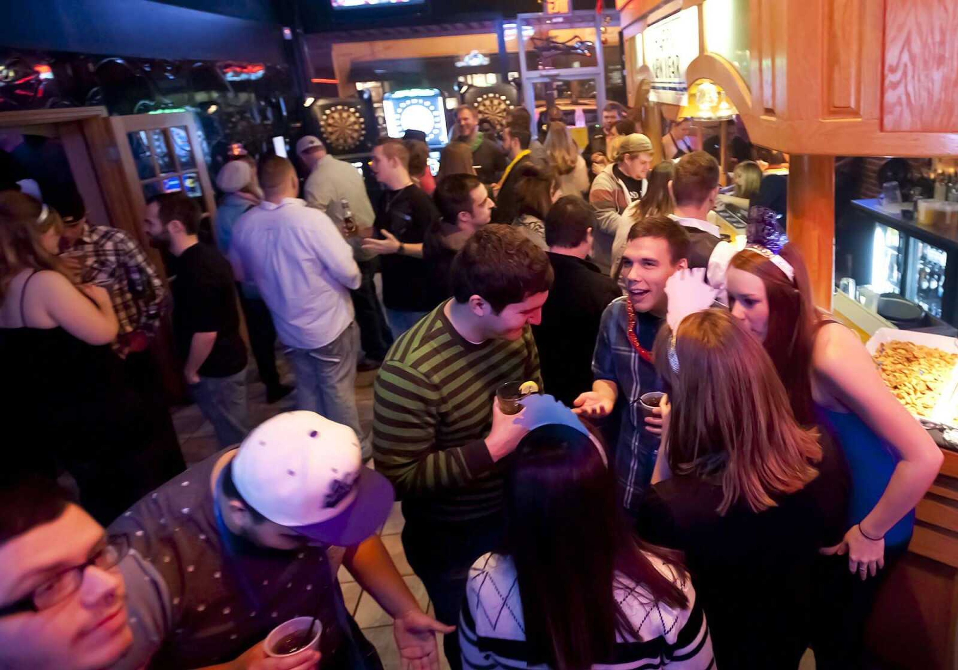 Revelers celebrate New Year's Eve on Dec. 31, 2013, at Mixing 10 in Cape Girardeau.