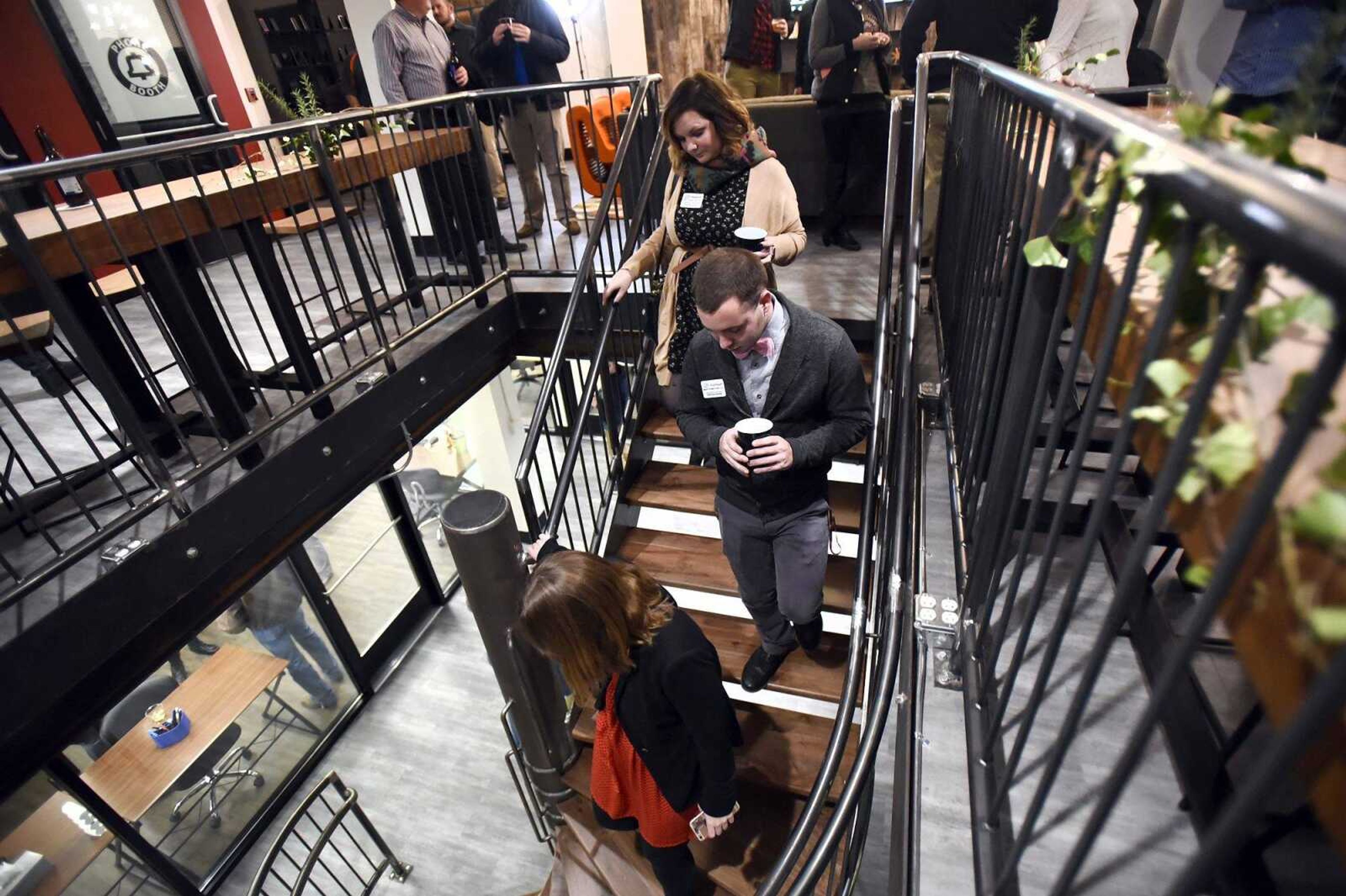 Visitors get a glimpse of the new Codefi location inside the Marquette Tower during its grand opening party Tuesday in Cape Girardeau.