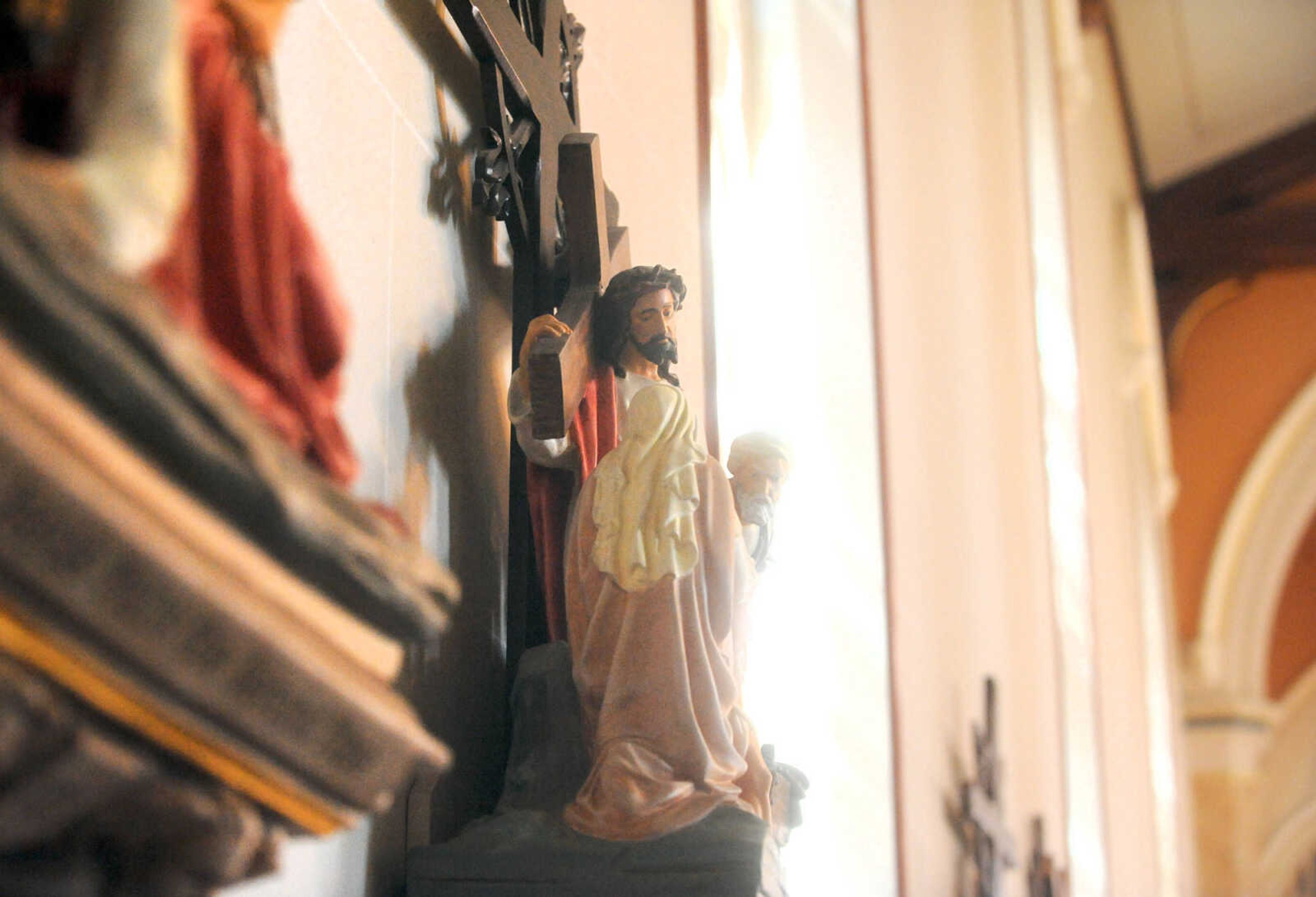 LAURA SIMON ~ lsimon@semissourian.com

The Stations of the Cross hang on the wall in the sanctuary of Old St. Vincent's Catholic Church, Monday, March 30, 2015, in downtown Cape Girardeau.