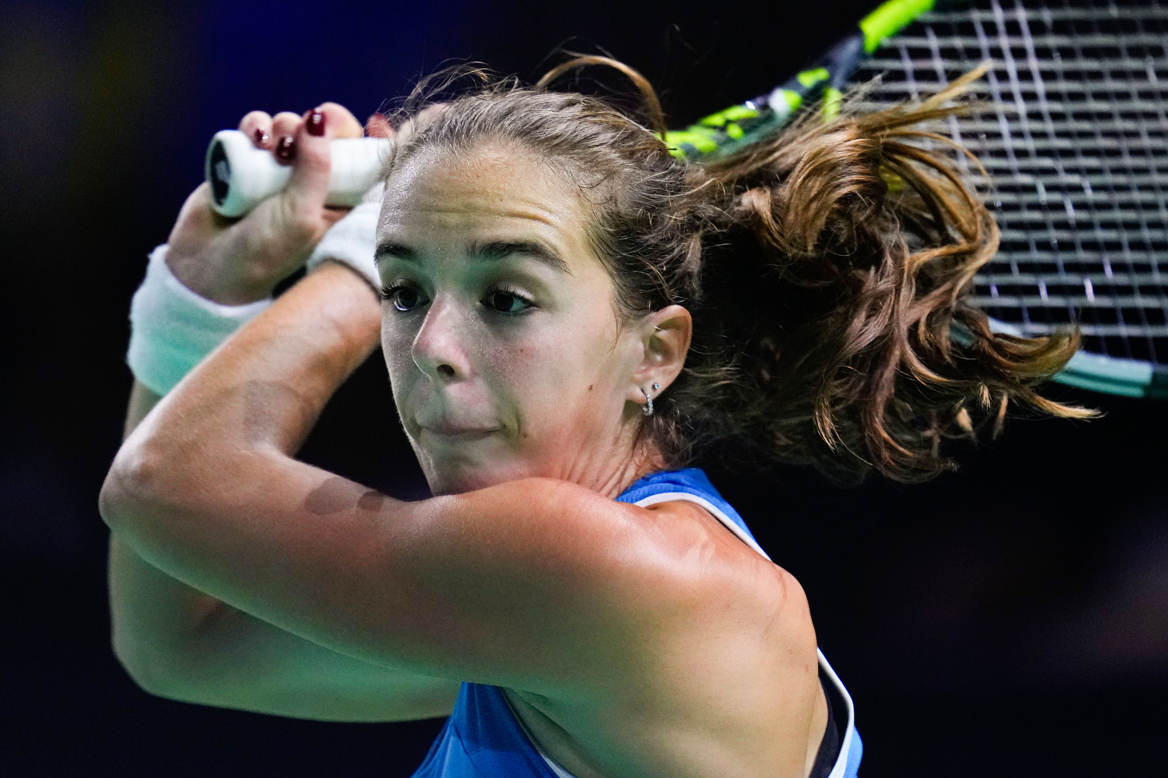 Italy's Lucia Bronzetti competes against Slovakia's Viktoria Hruncakova during the Billie Jean King Cup final at the Martin Carpena Sports Hall in Malaga, southern Spain, Wednesday, Nov. 20, 2024. (AP Photo/Manu Fernandez)